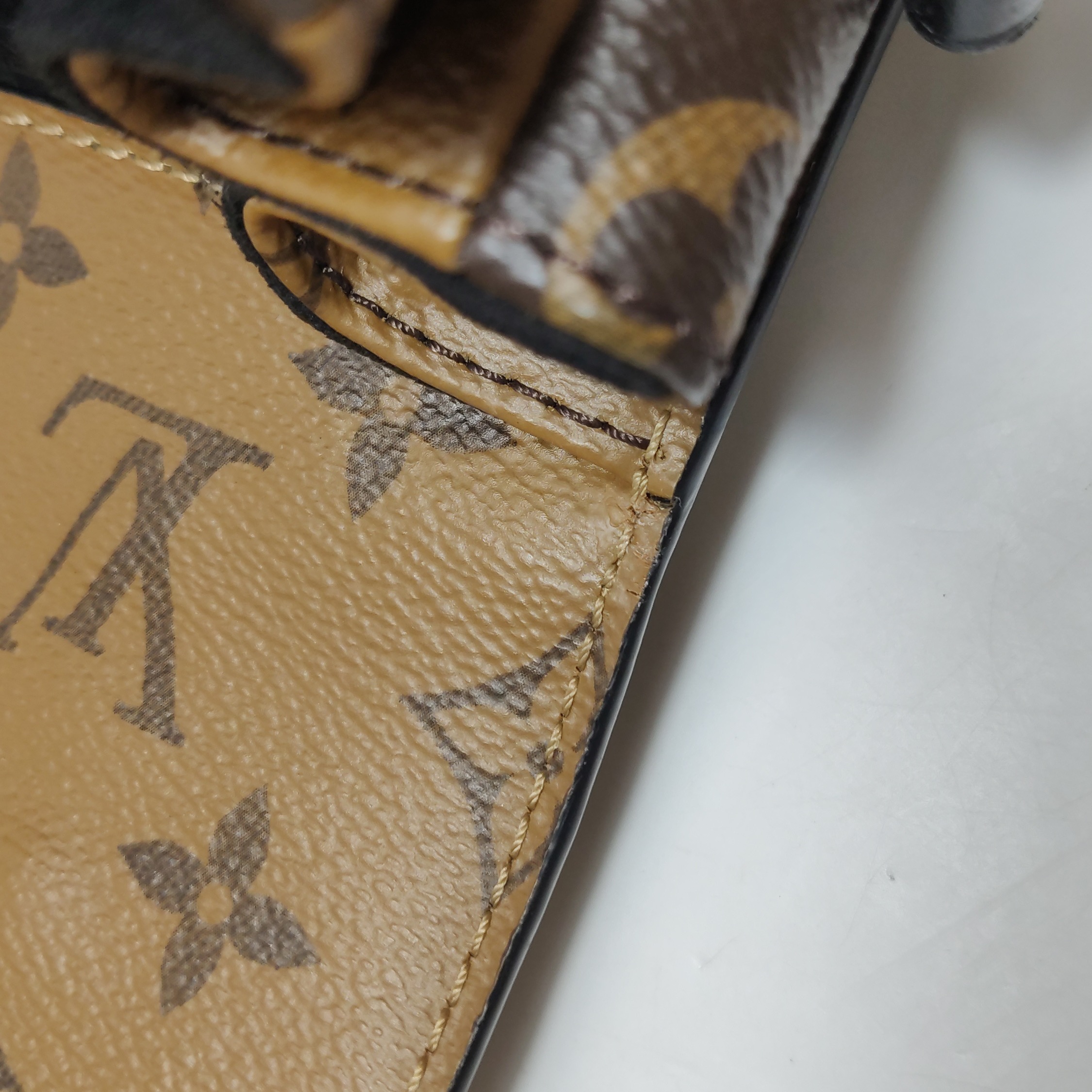 Louis Vuitton(LV) Pochette Metis Reverse Monogram Canvas — photo 13 of 24