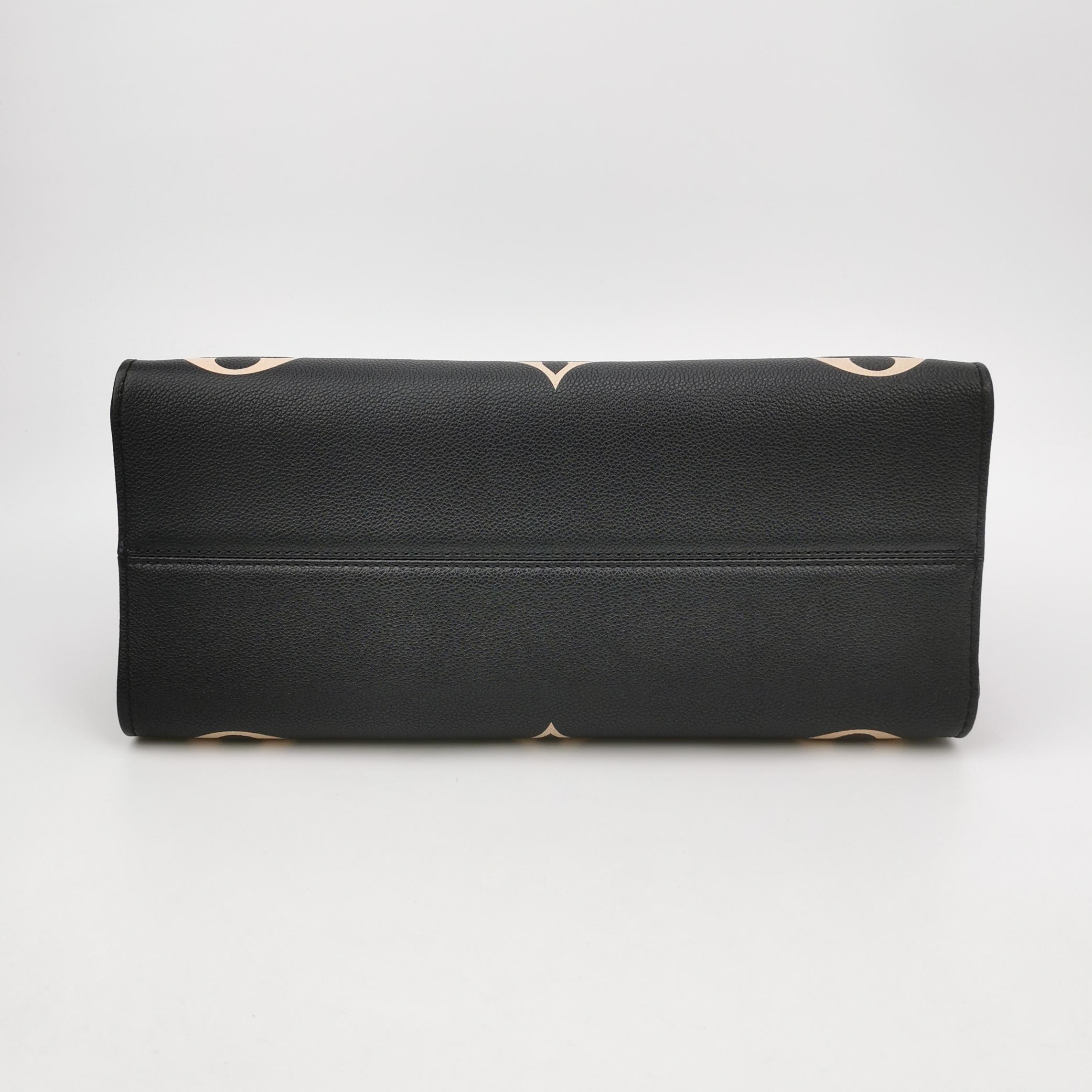 Louis Vuitton(LV) OnTheGo Tote Bicolor Monogram Empreinte Giant MM — photo 6 of 14
