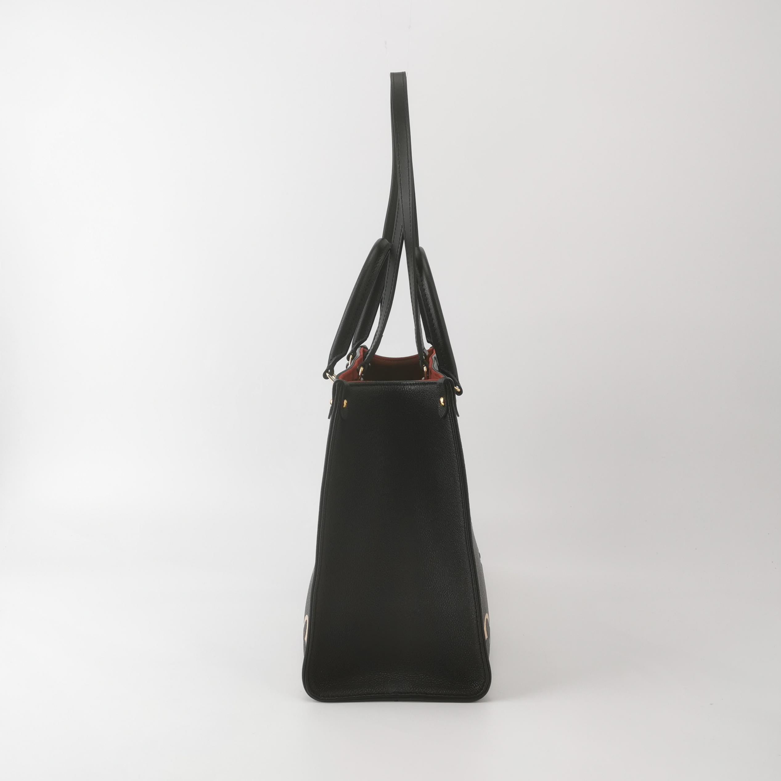 Louis Vuitton(LV) OnTheGo Tote Bicolor Monogram Empreinte Giant MM — photo 5 of 13
