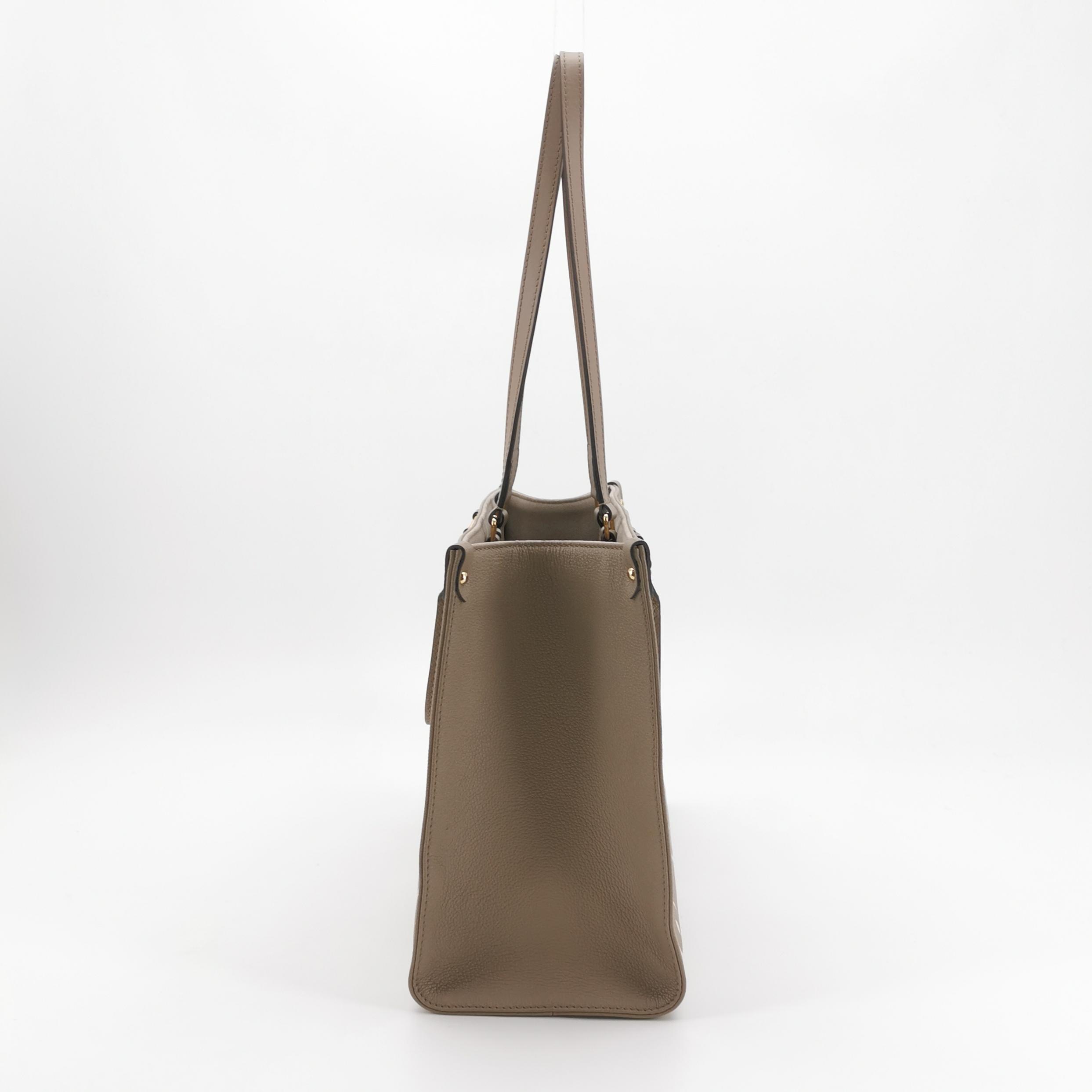 Louis Vuitton(LV) OnTheGo Tote Bicolor Monogram Empreinte Giant MM — photo 4 of 15