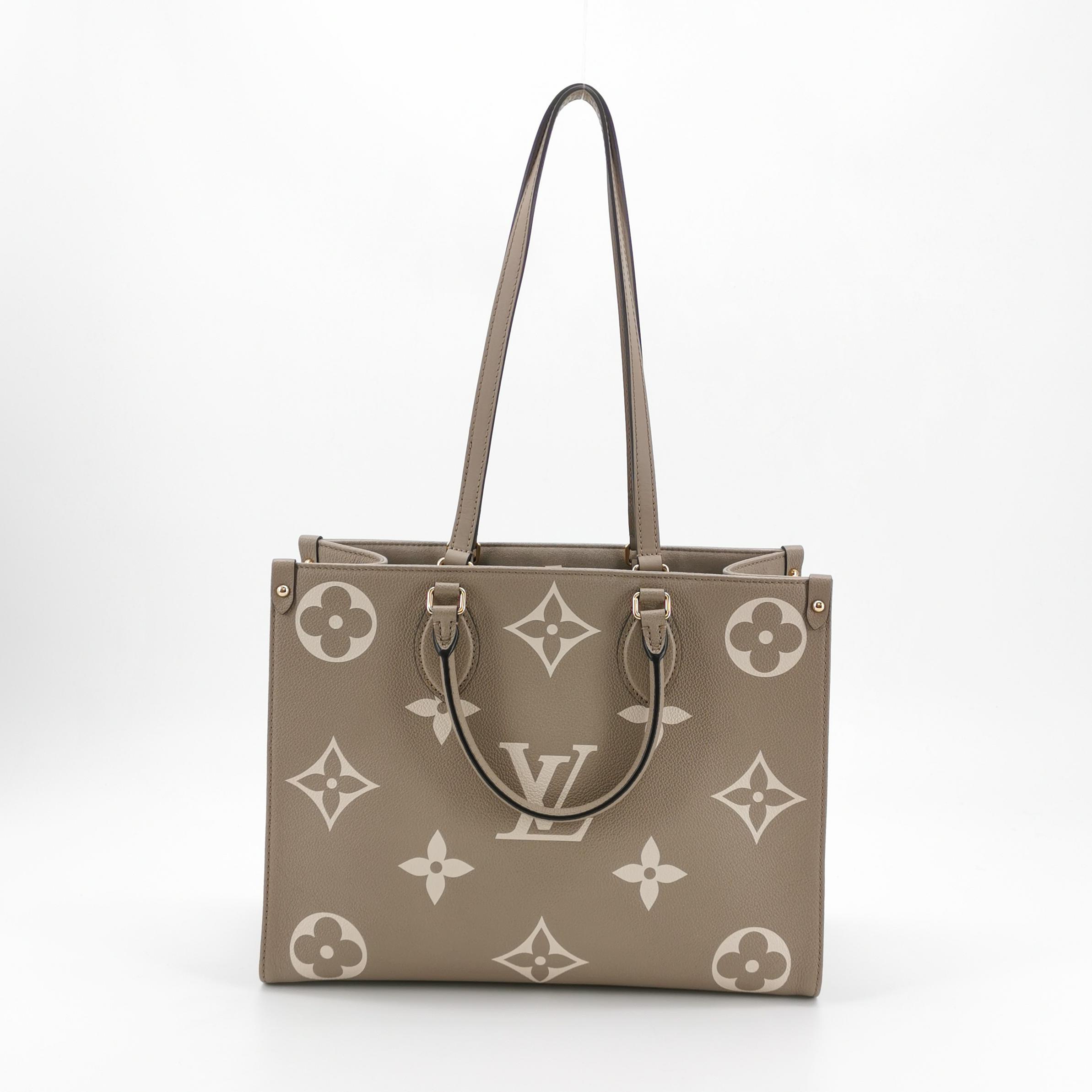 Louis Vuitton(LV) OnTheGo Tote Bicolor Monogram Empreinte Giant MM — photo 3 of 15