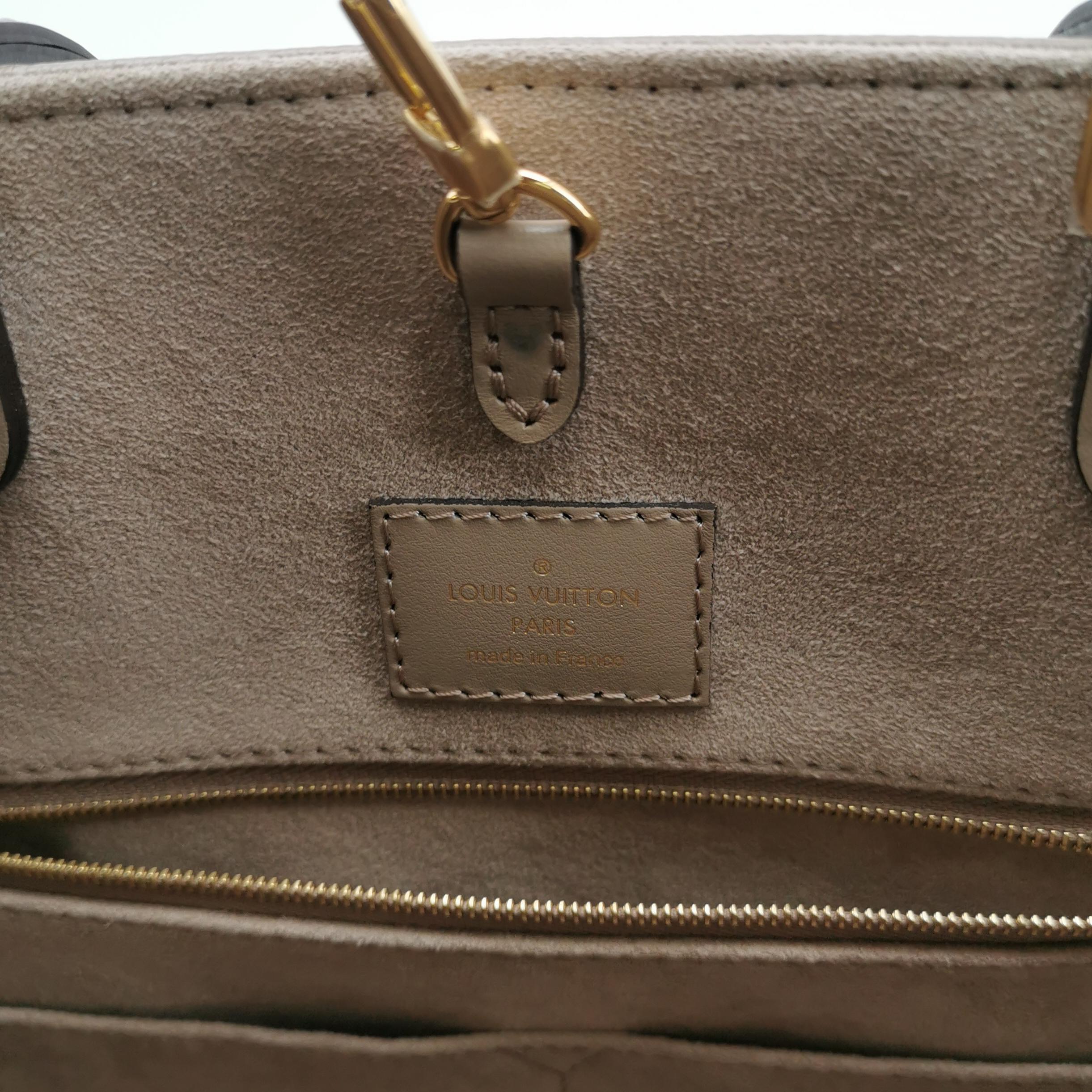 Louis Vuitton(LV) OnTheGo Tote Bicolor Monogram Empreinte Giant MM — photo 8 of 14