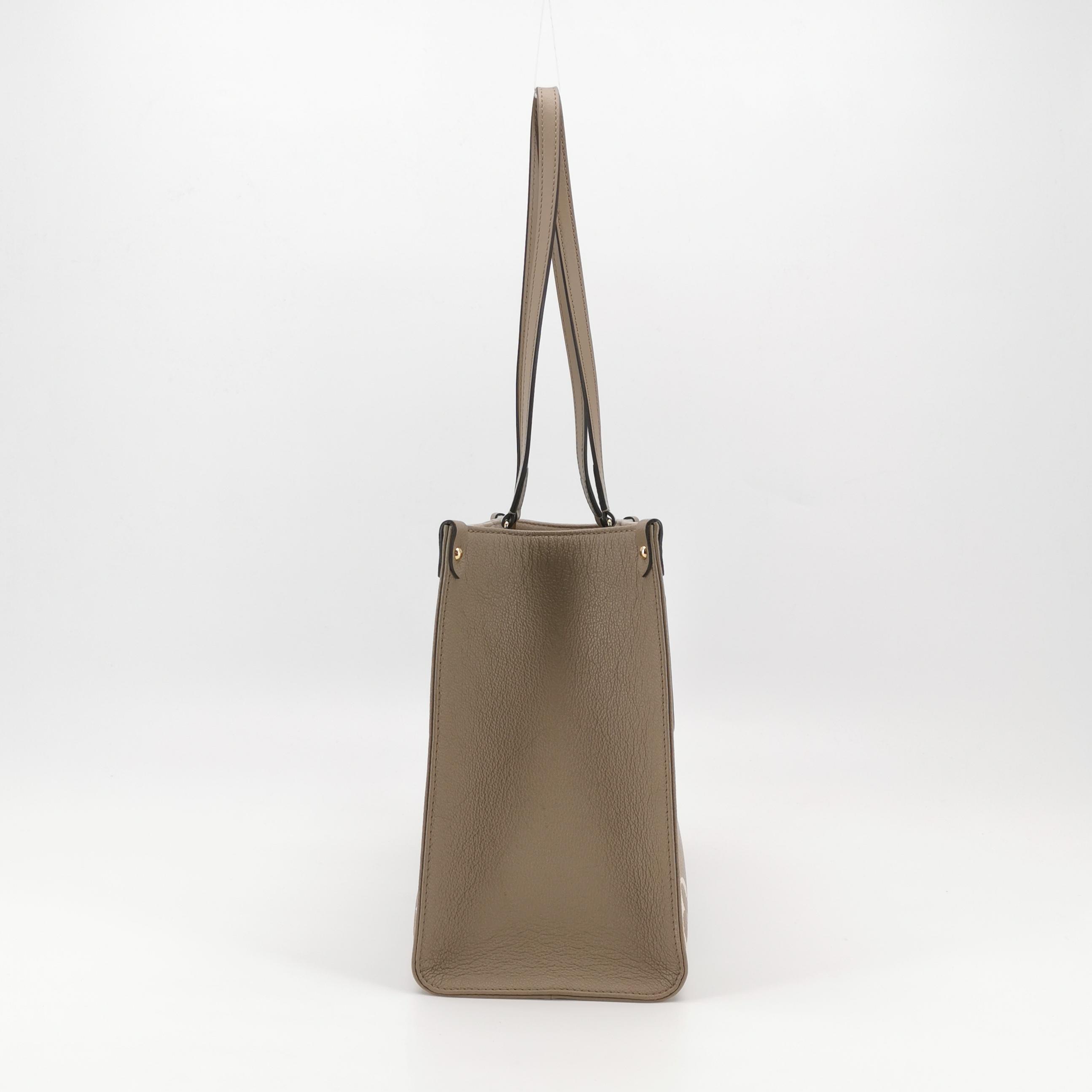 Louis Vuitton(LV) OnTheGo Tote Bicolor Monogram Empreinte Giant MM — photo 5 of 15