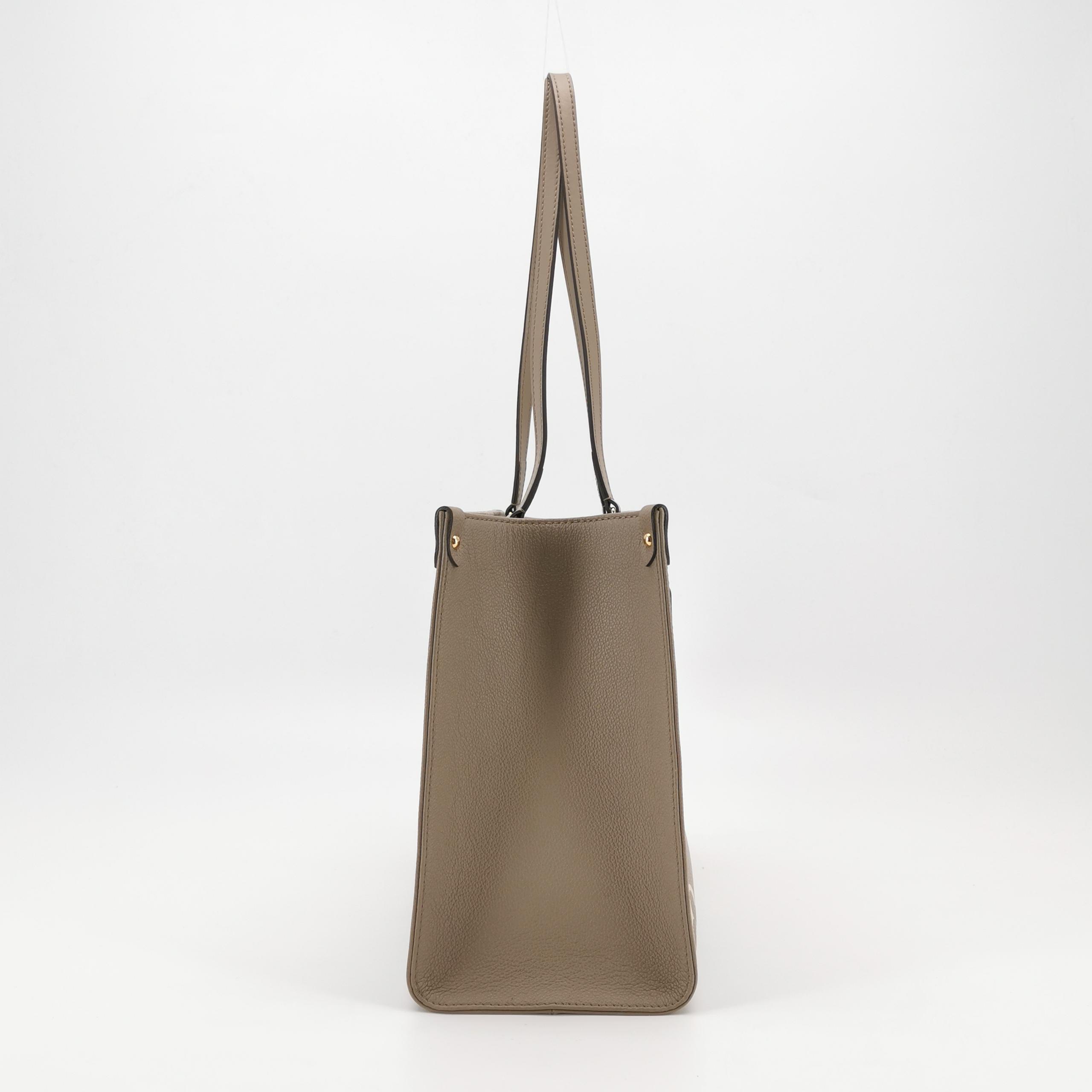 Louis Vuitton(LV) OnTheGo Tote Bicolor Monogram Empreinte Giant MM — photo 4 of 15