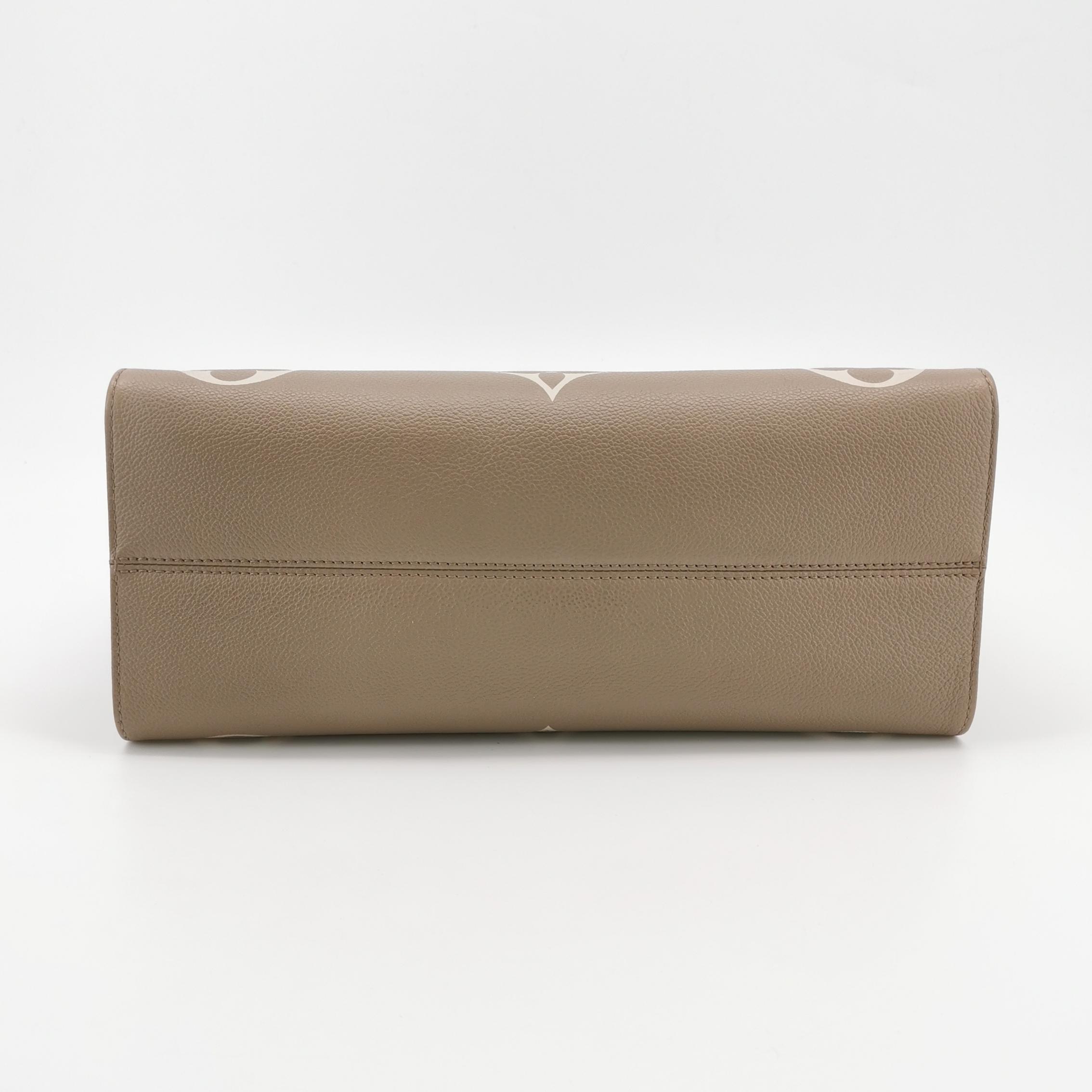 Louis Vuitton(LV) OnTheGo Tote Bicolor Monogram Empreinte Giant MM — photo 6 of 15