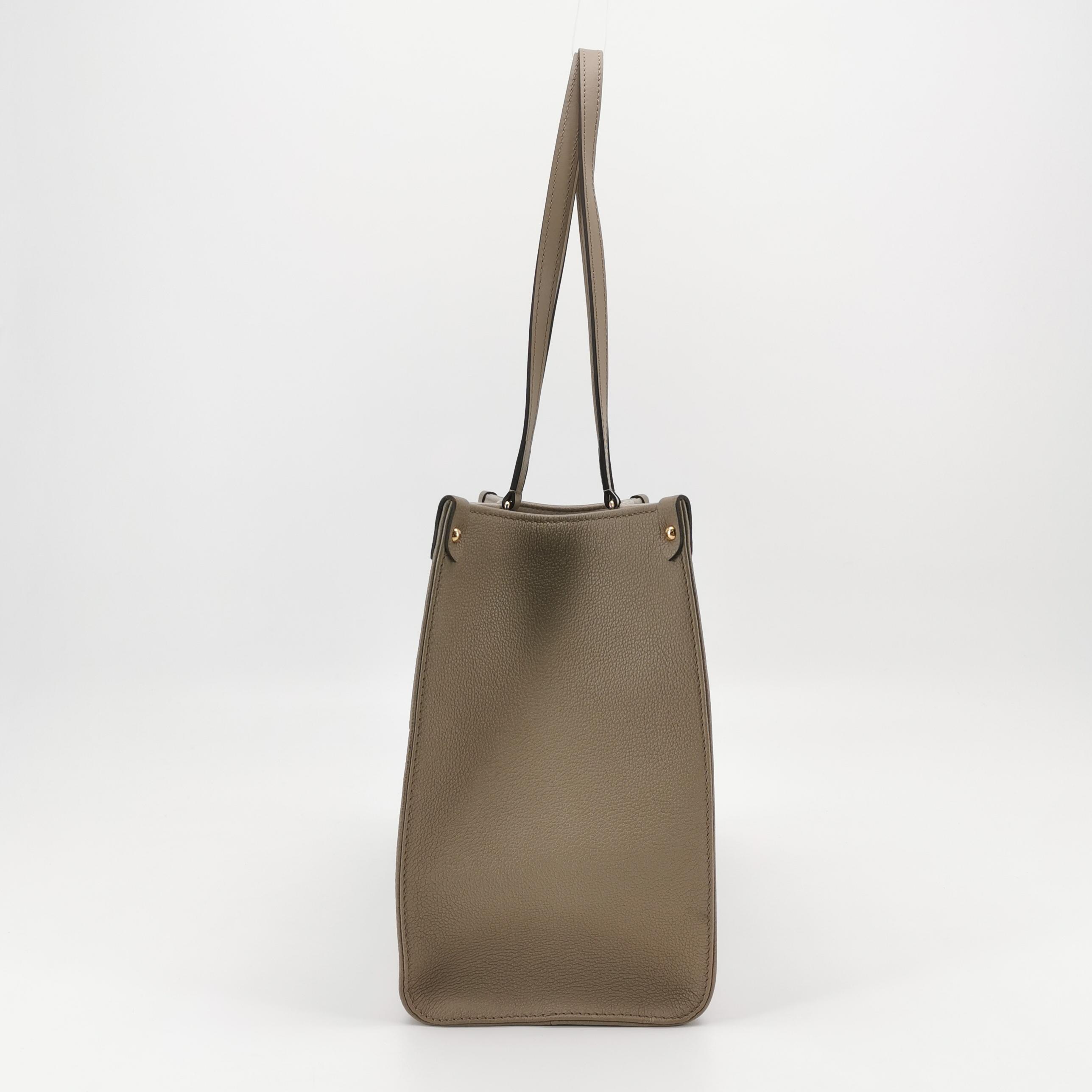 Louis Vuitton(LV) OnTheGo Tote Bicolor Monogram Empreinte Giant MM — photo 4 of 14