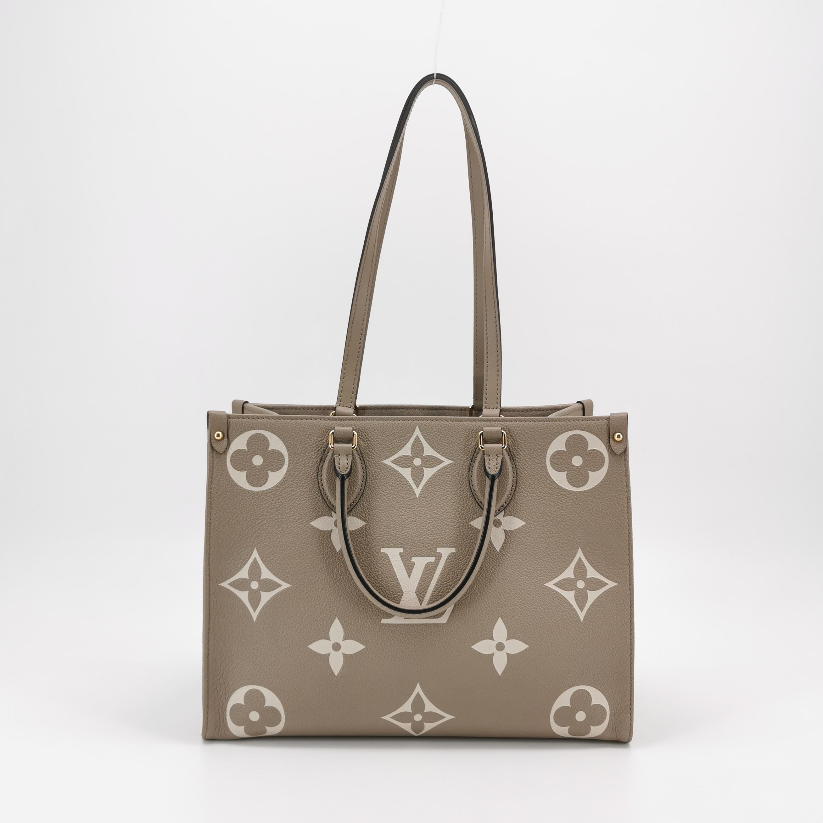 Louis Vuitton(LV) OnTheGo Tote Bicolor Monogram Empreinte Giant MM — photo 3 of 14