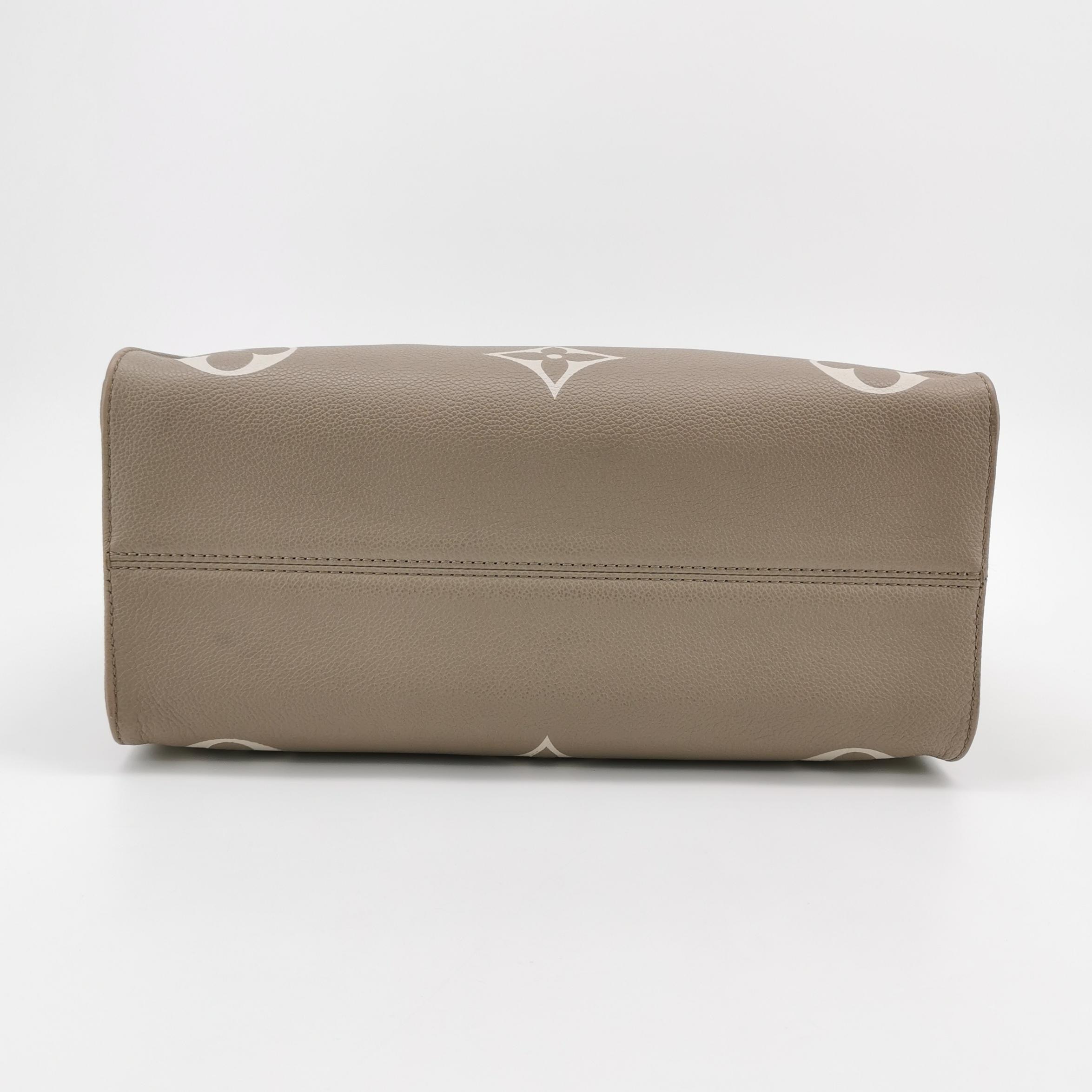 Louis Vuitton(LV) OnTheGo Tote Bicolor Monogram Empreinte Giant MM — photo 6 of 14