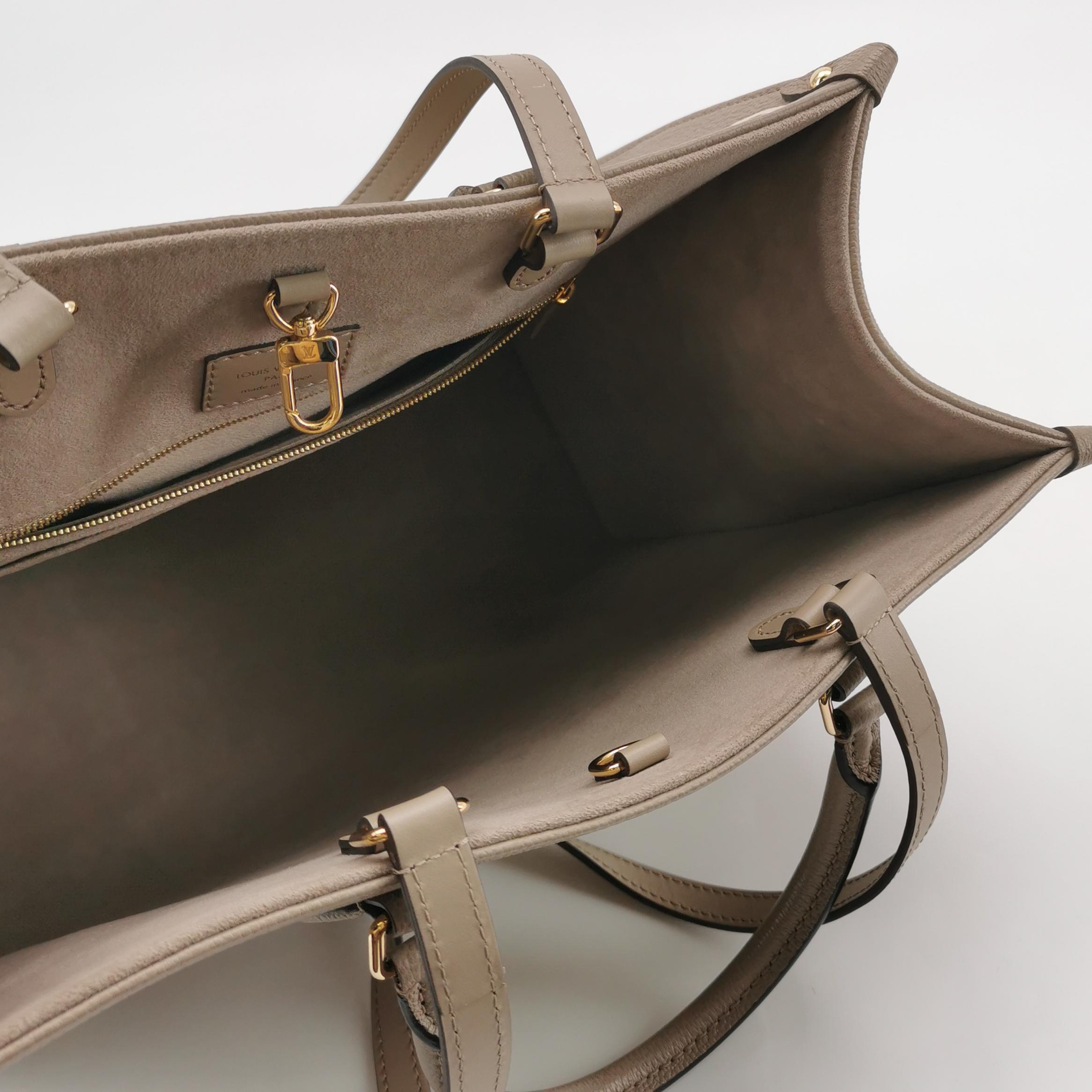 Louis Vuitton(LV) OnTheGo Tote Bicolor Monogram Empreinte Giant MM — photo 7 of 14