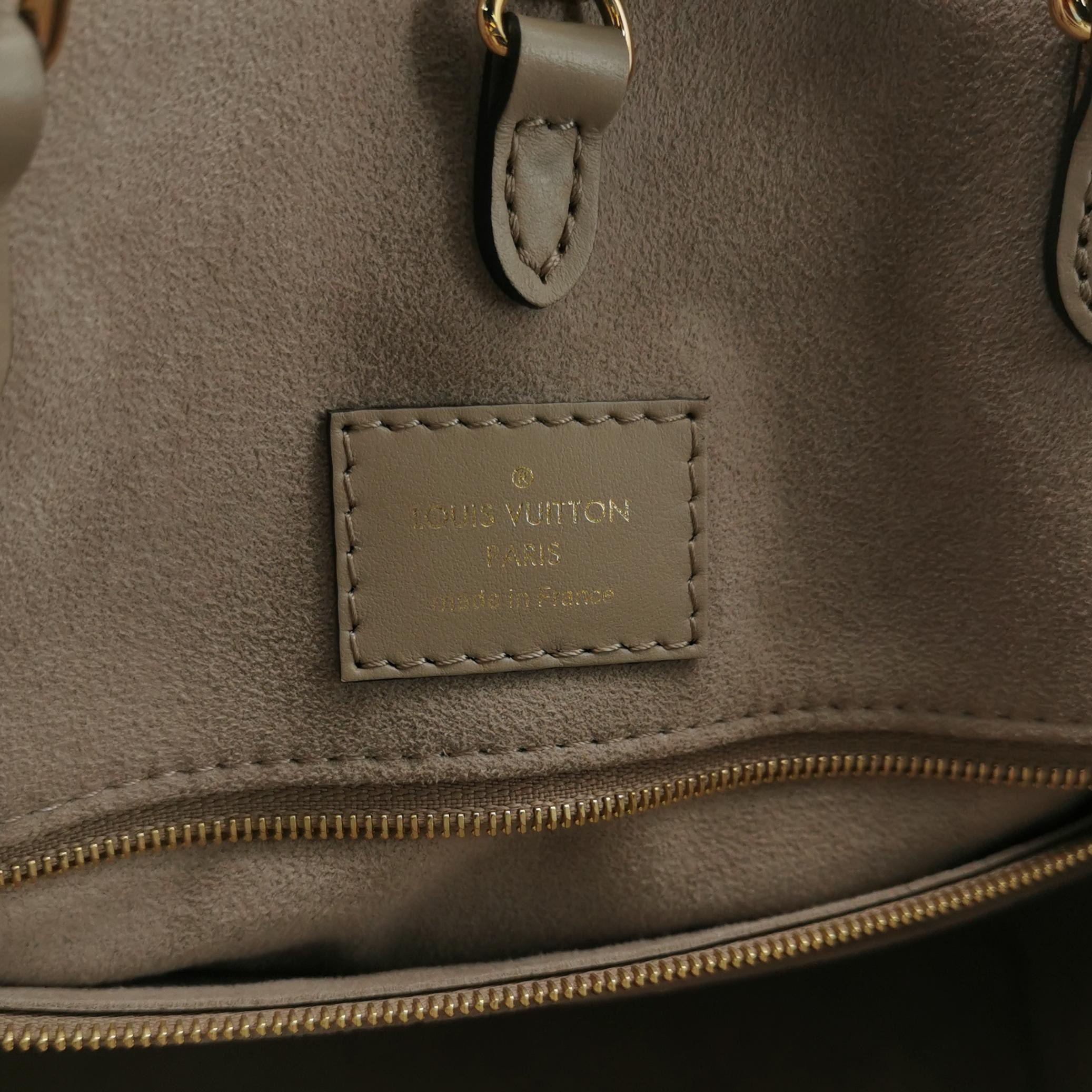 Louis Vuitton(LV) OnTheGo Tote Bicolor Monogram Empreinte Giant MM — photo 8 of 14