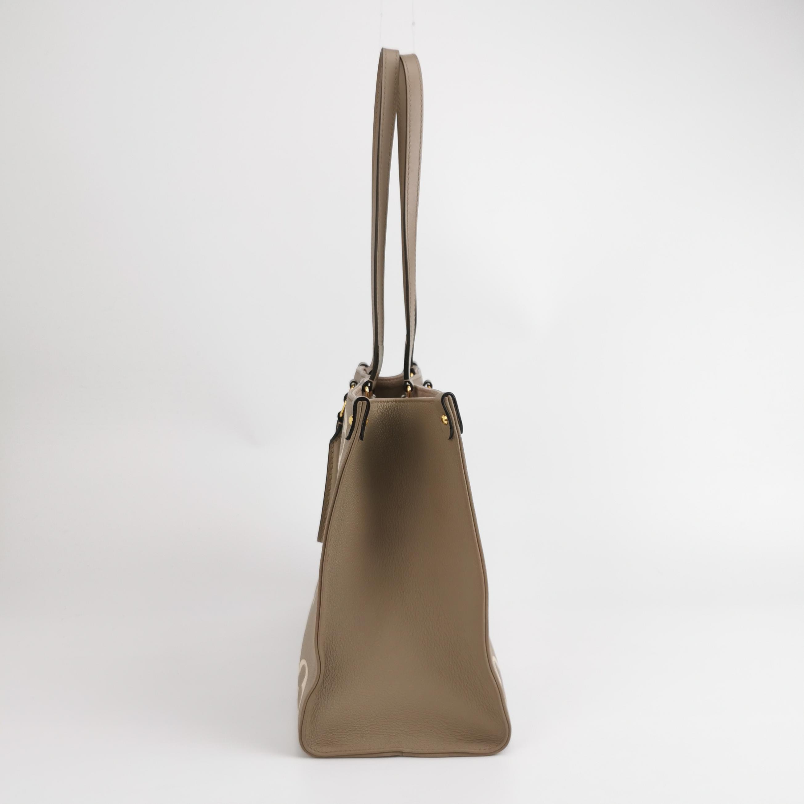Louis Vuitton(LV) OnTheGo Tote Bicolor Monogram Empreinte Giant MM — photo 4 of 13