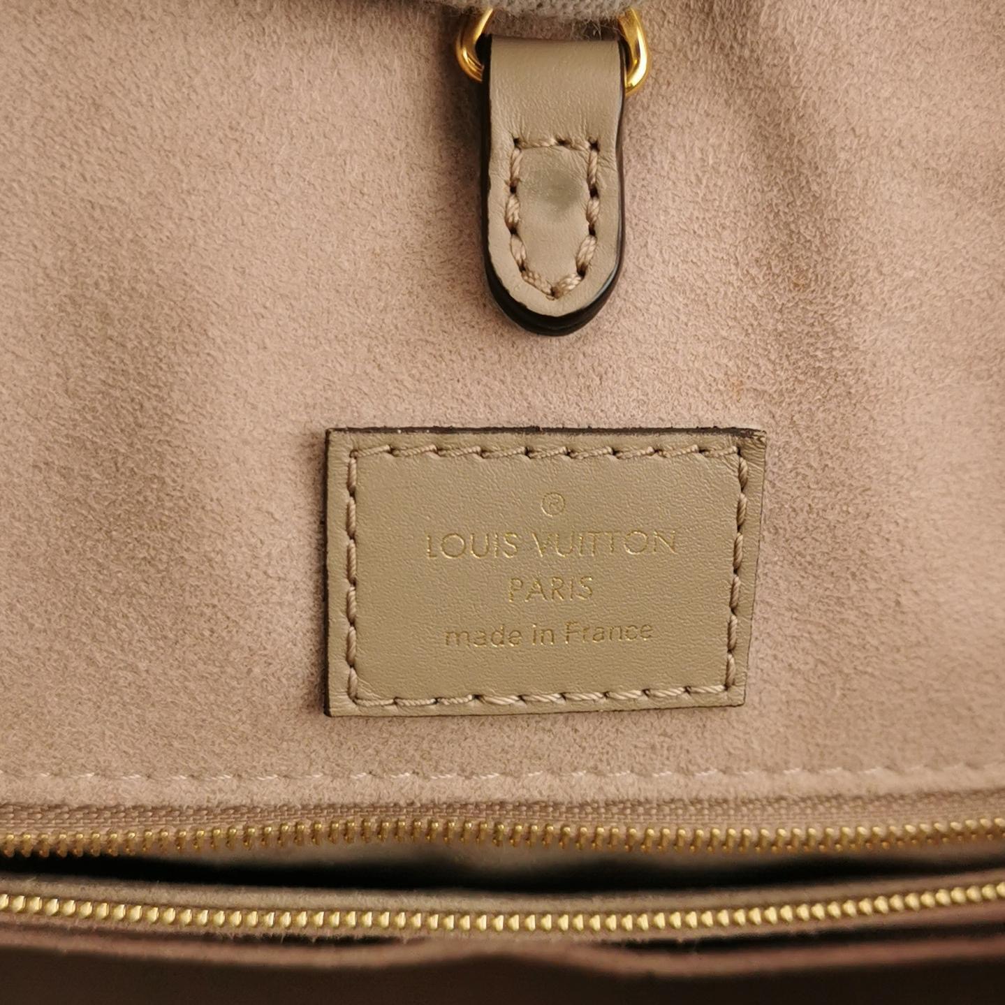 Louis Vuitton(LV) OnTheGo Tote Bicolor Monogram Empreinte Giant MM — photo 8 of 13