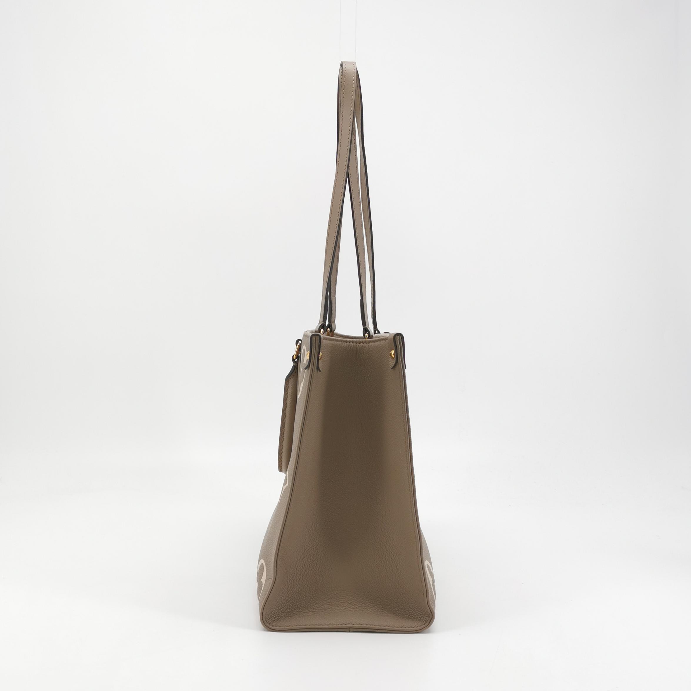 Louis Vuitton(LV) OnTheGo Tote Bicolor Monogram Empreinte Giant MM — photo 4 of 16