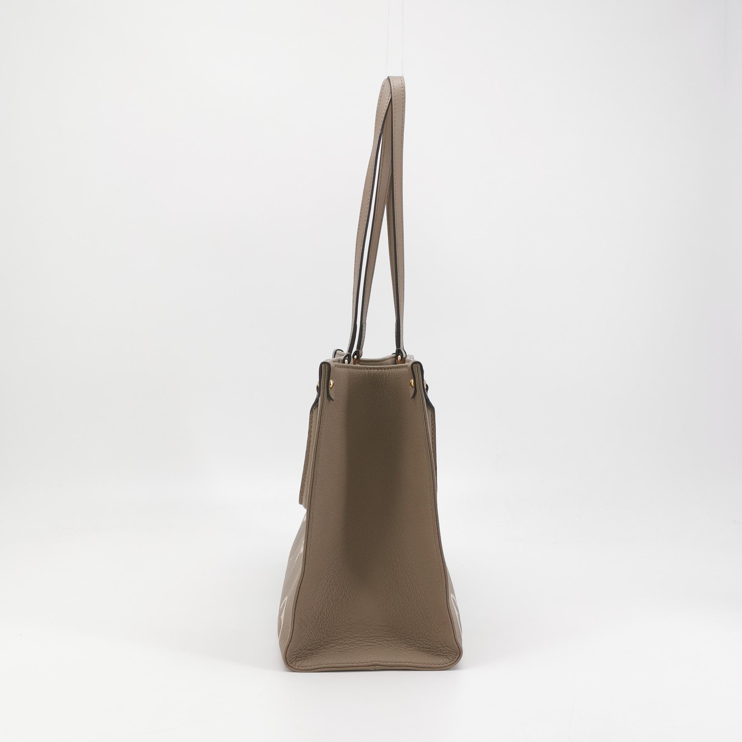 Louis Vuitton(LV) OnTheGo Tote Bicolor Monogram Empreinte Giant MM — photo 5 of 16