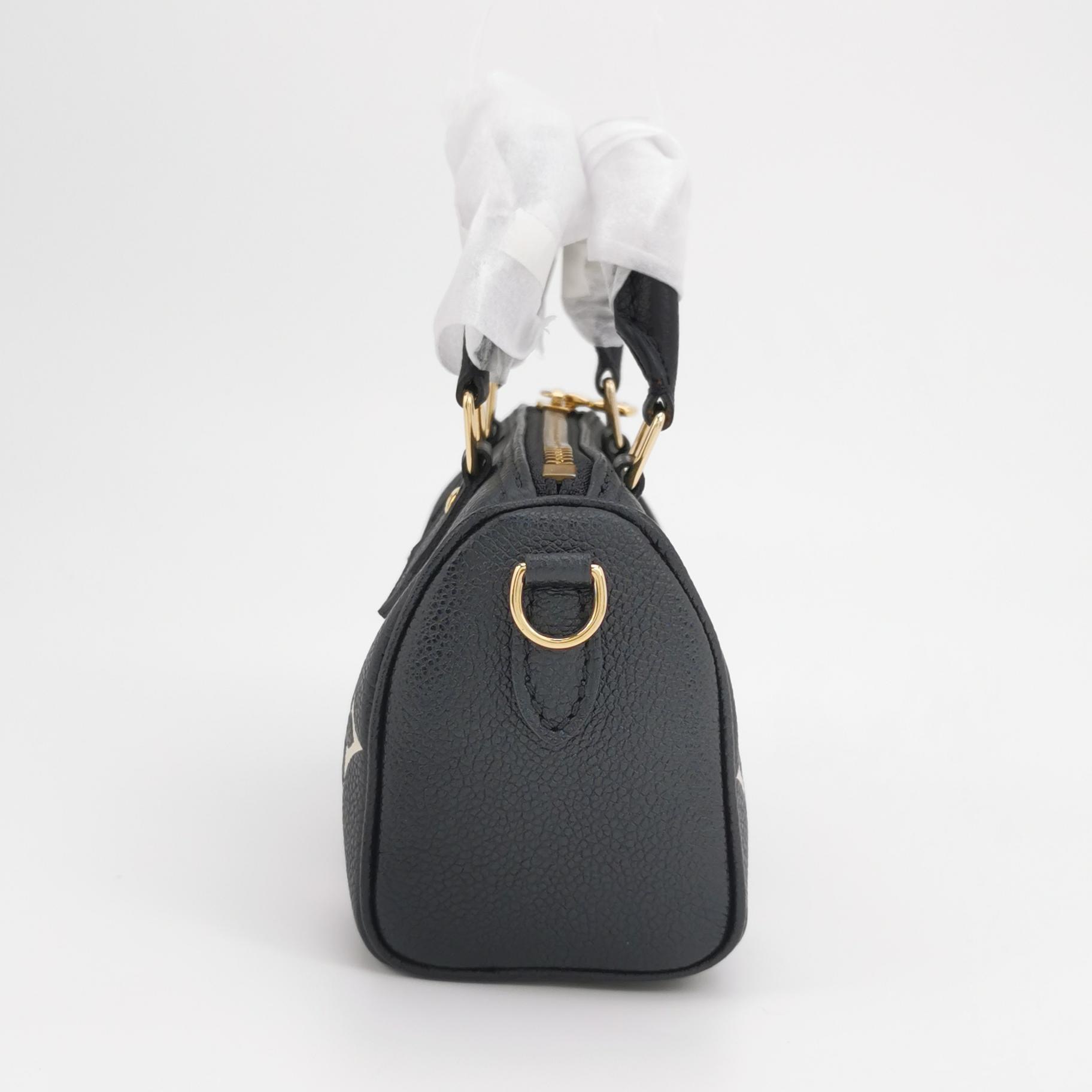 Louis Vuitton(Lv) Speedy Bandouliere NM Bag Bicolor Monogram Empreinte Giant Nano — photo 3 of 14