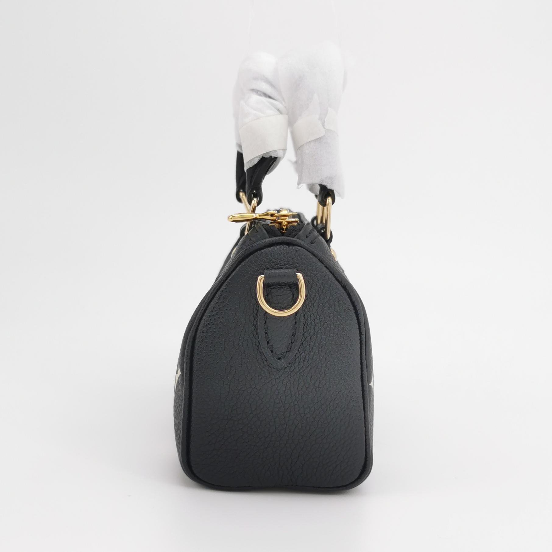 Louis Vuitton(Lv) Speedy Bandouliere NM Bag Bicolor Monogram Empreinte Giant Nano — photo 4 of 14