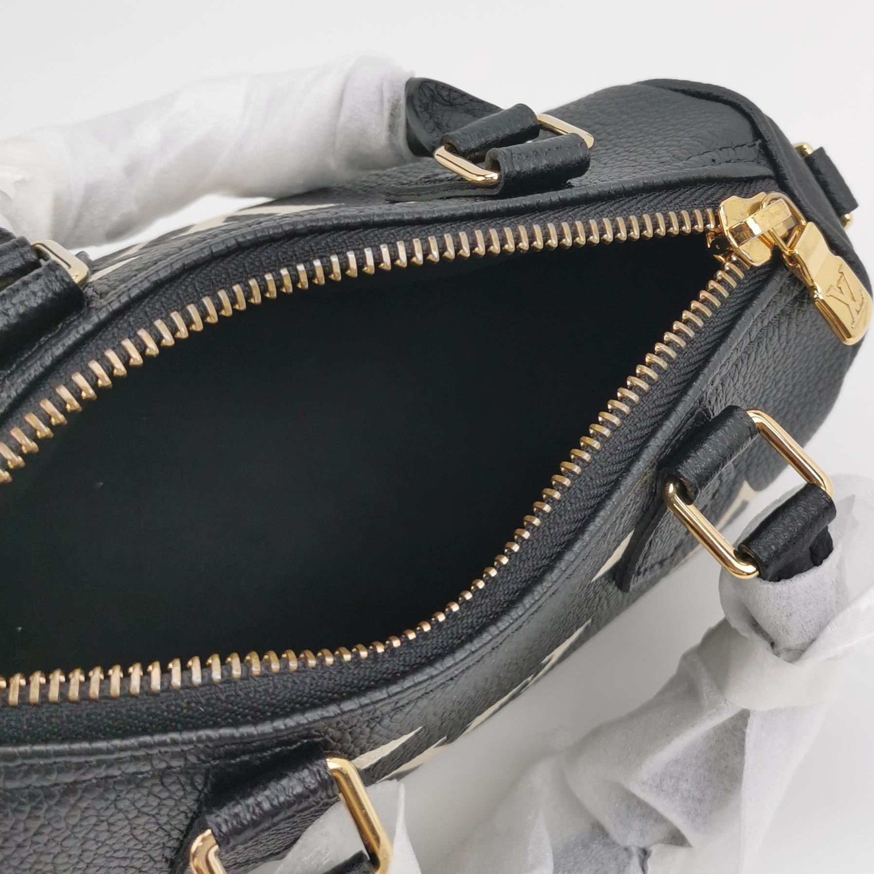 Louis Vuitton(Lv) Speedy Bandouliere NM Bag Bicolor Monogram Empreinte Giant Nano — photo 8 of 14