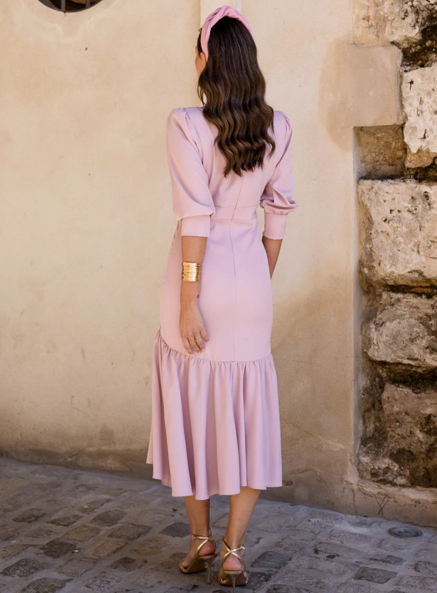Nude pink midi dress with a ruffled hem