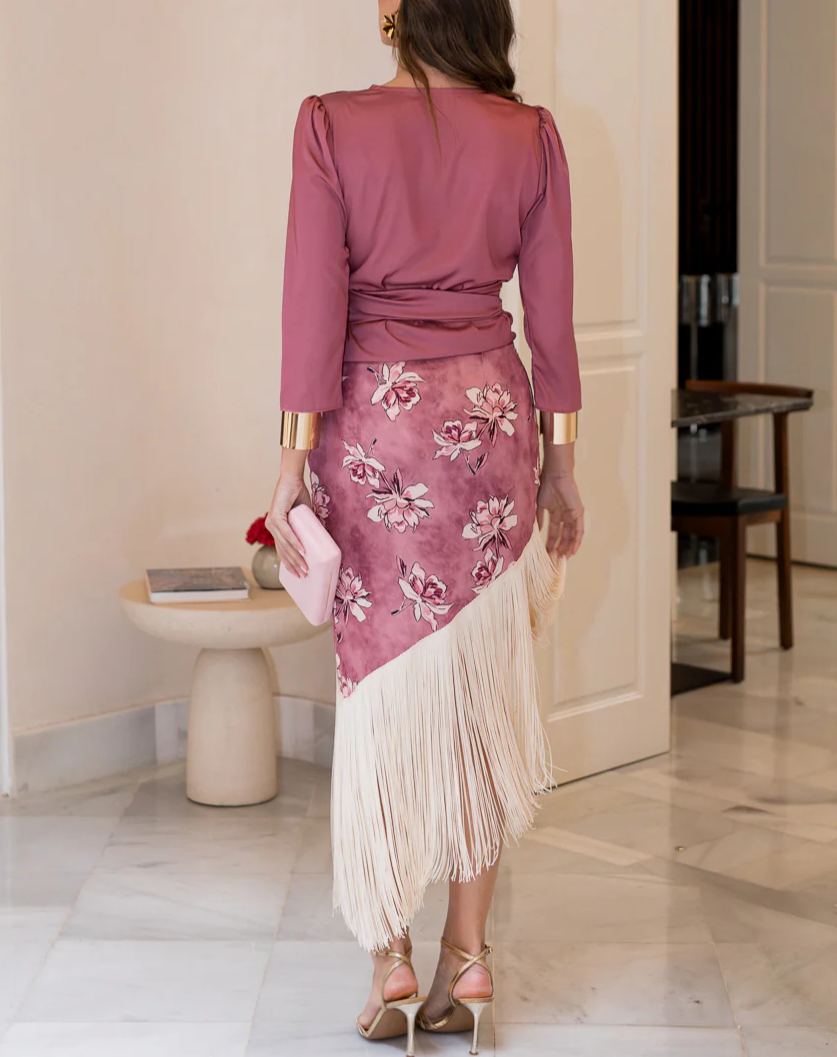 Blouse and fringed skirt set in dusty pink.