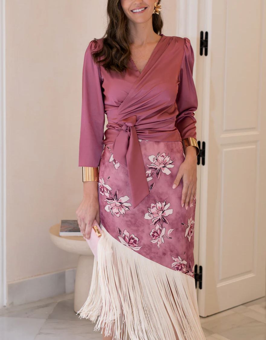 Blouse and fringed skirt set in dusty pink.