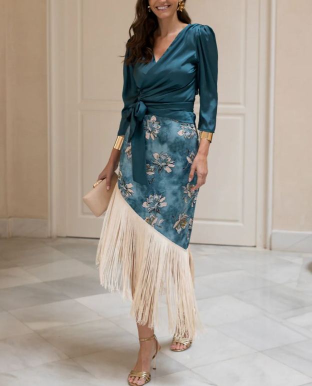 Blouse and fringed skirt set in petrol blue.