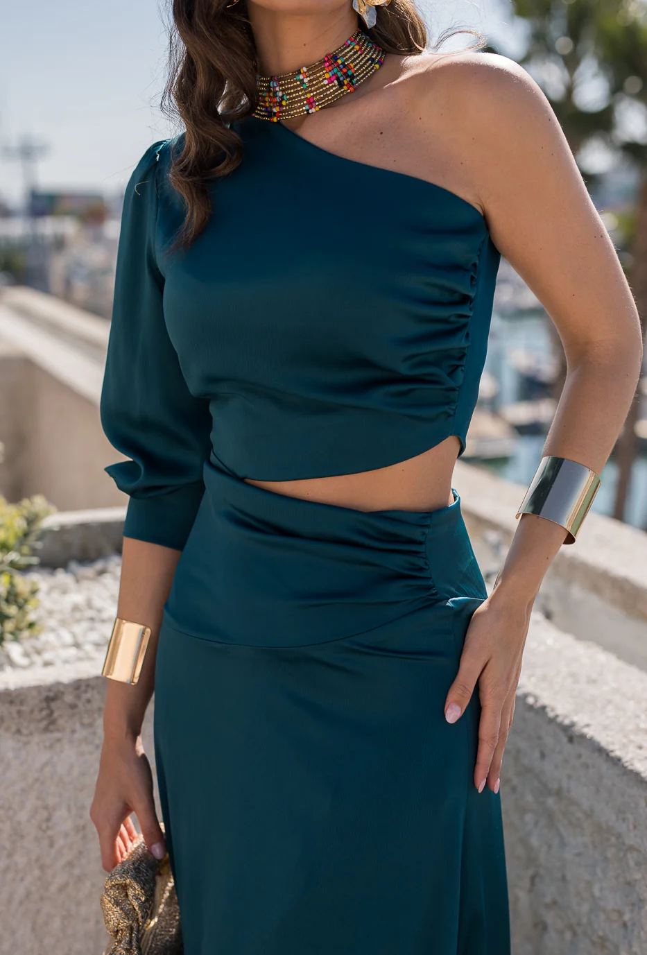 Long dress with asymmetrical neckline and cut-out in green