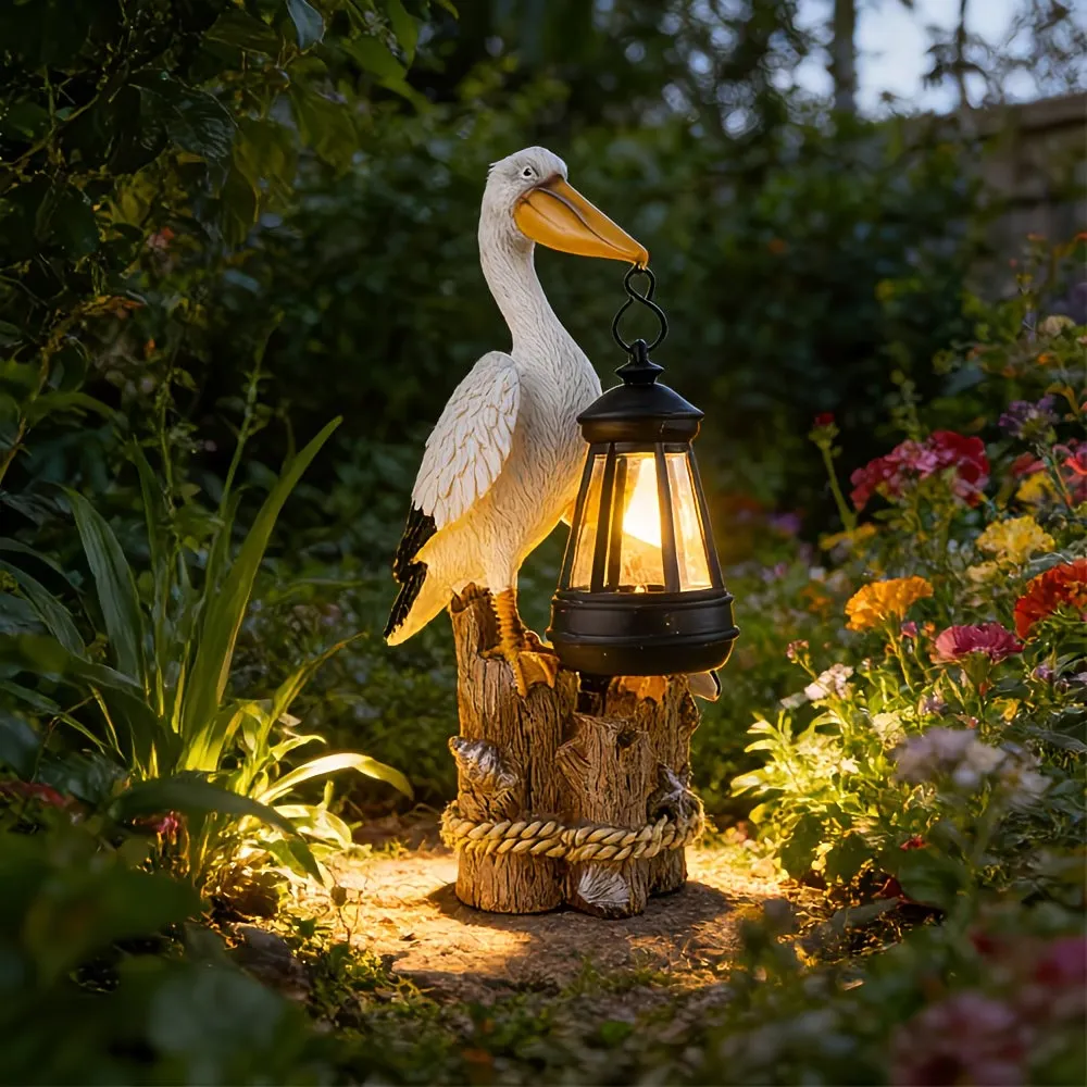 Whimsical Solar Pelican Mother & Baby Garden Lantern StatueThe sweet detail of the baby pelican leaning closely against the larger pelican gives this piece an especially warm, loving feel. From the textured feather detailing to the hanging lantern, wood-l