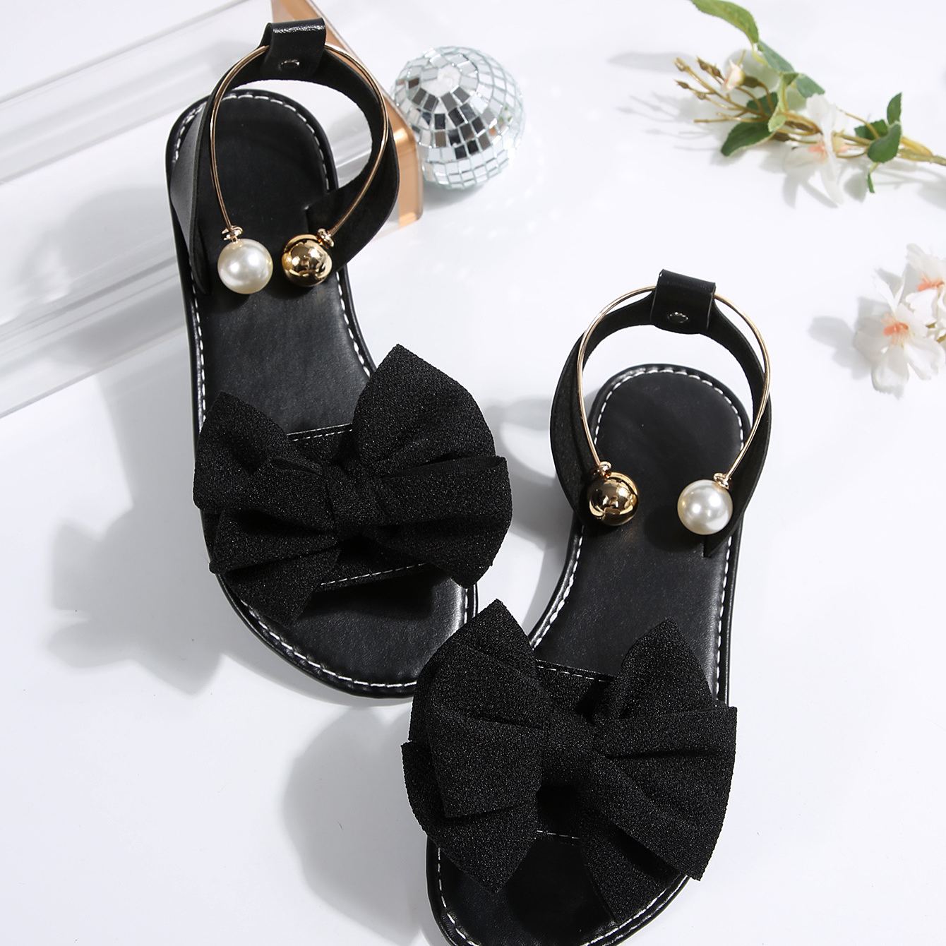 🔥LAST DAY 60% OFF🔥Women's Summer New Style Metal Buckle Single-Strap Flat Sandals with Bowknot and Pearl Versatile Casual Beach Sandals