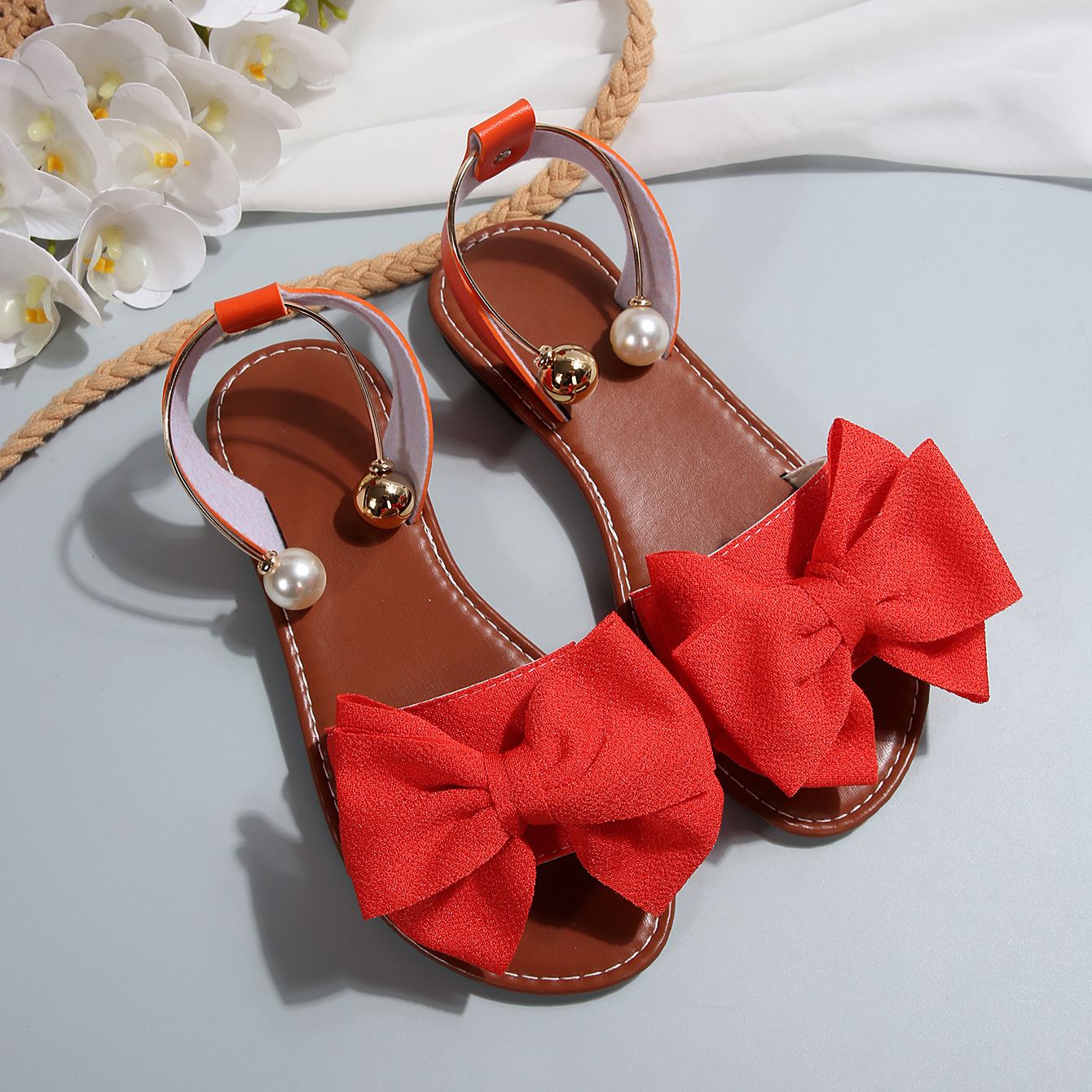 🔥LAST DAY 60% OFF🔥Women's Summer New Style Metal Buckle Single-Strap Flat Sandals with Bowknot and Pearl Versatile Casual Beach Sandals