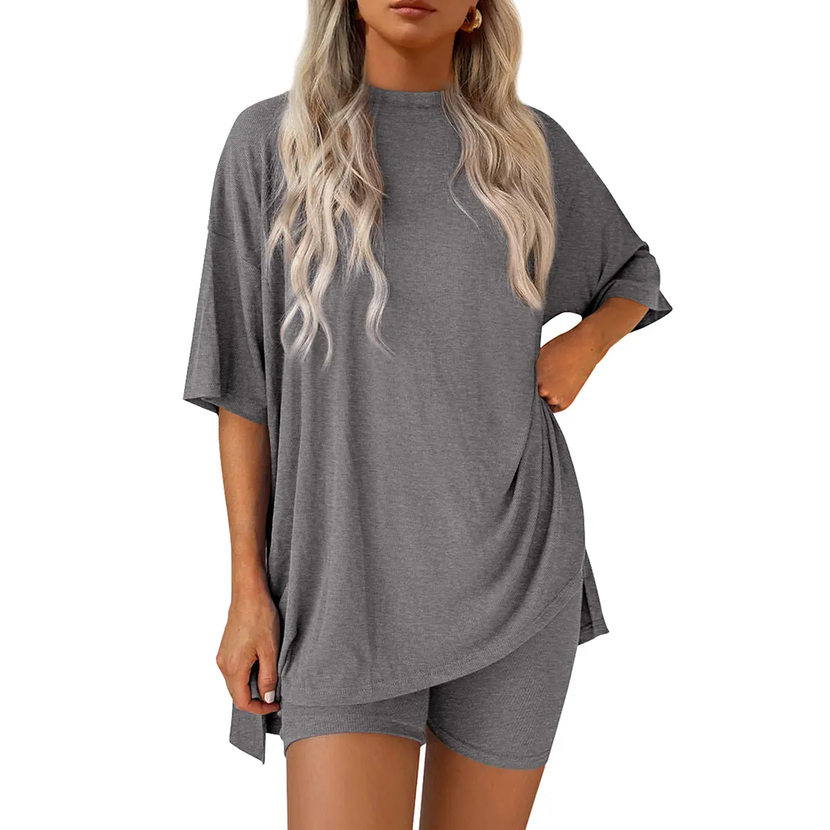 Women's summer casual loose two-piece set: round neck, slit hem shirt paired with side pocket cycling shorts; simple loungewear, soft viscose fabric, comfortable loungewear, cozy pajamas.