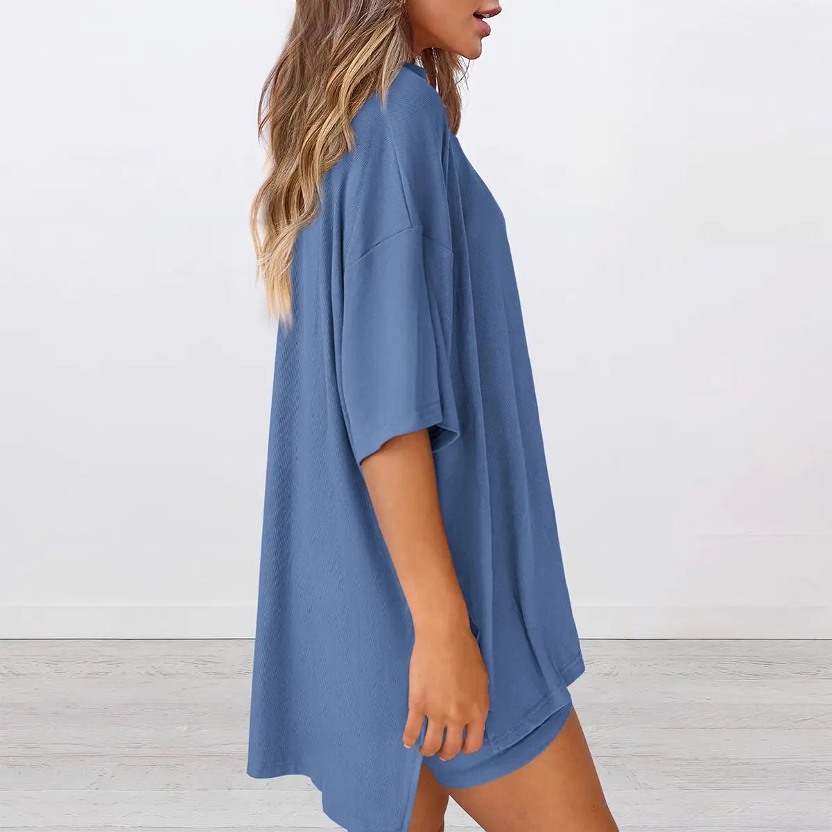 Women's summer casual loose two-piece set: round neck, slit hem shirt paired with side pocket cycling shorts; simple loungewear, soft viscose fabric, comfortable loungewear, cozy pajamas.