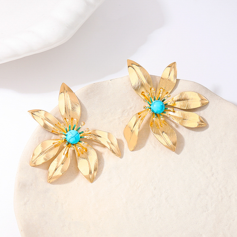 Women's Earrings Featuring A Striking Metallic Floral Design and Turquoise Accents
