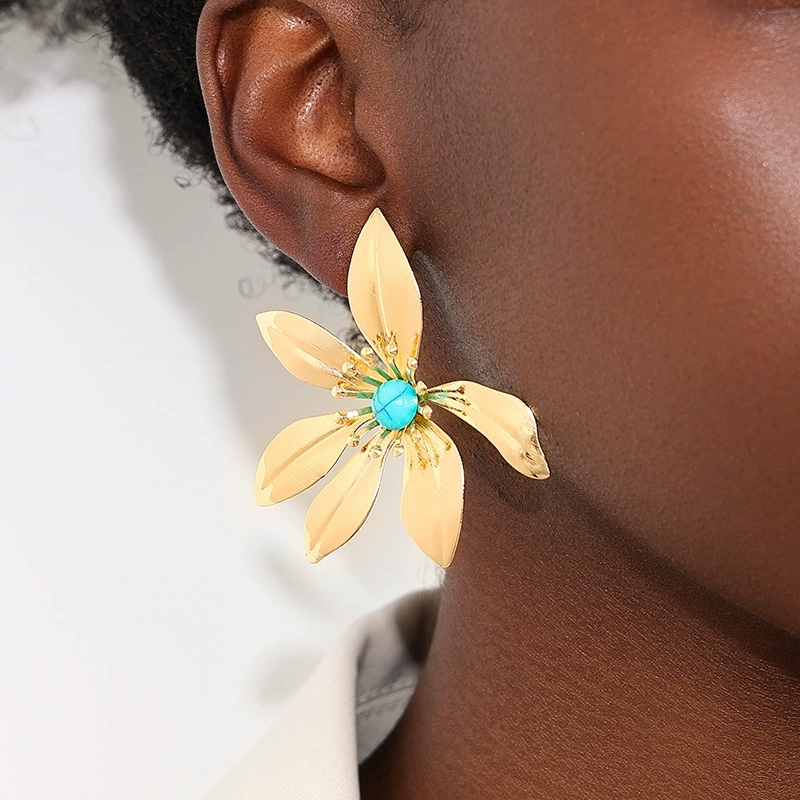 Women's Earrings Featuring A Striking Metallic Floral Design and Turquoise Accents