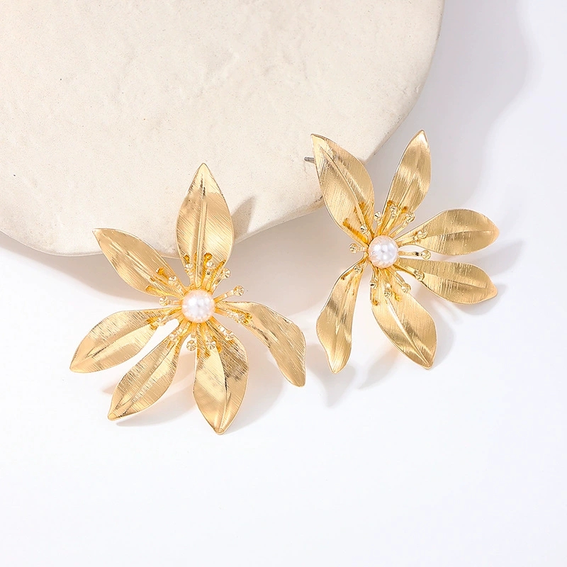 Women's Earrings Featuring A Striking Metallic Floral Design and Turquoise Accents