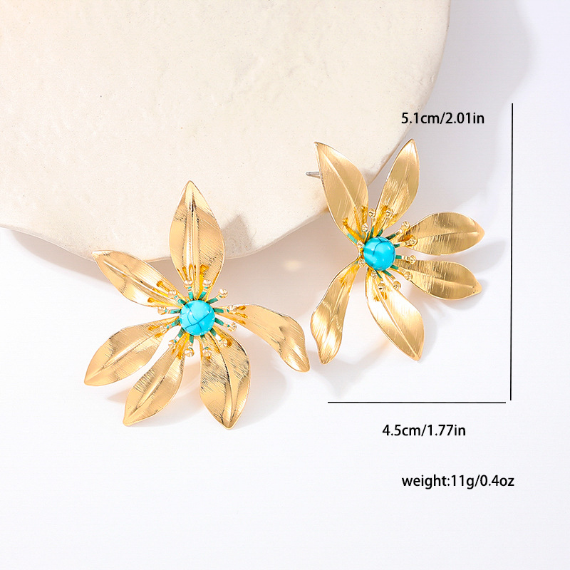 Women's Earrings Featuring A Striking Metallic Floral Design and Turquoise Accents