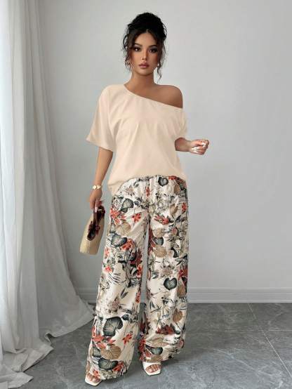 Women Summer Casual Solid Color Asymmetrical Shoulder Top And Floral Print Pants Set