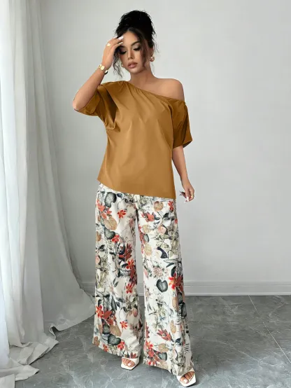 Women Summer Casual Solid Color Asymmetrical Shoulder Top And Floral Print Pants Set