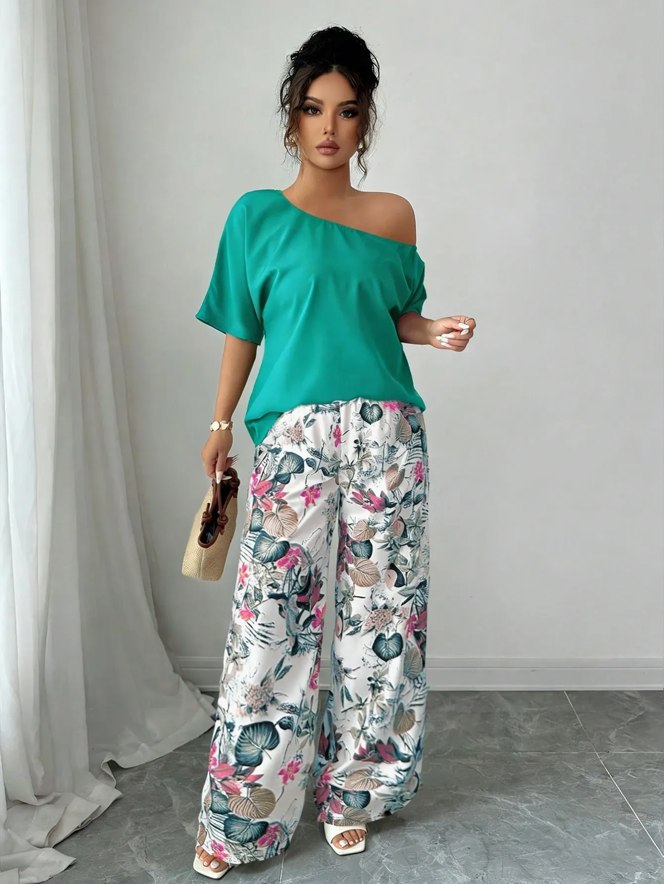 Women Summer Casual Solid Color Asymmetrical Shoulder Top And Floral Print Pants Set