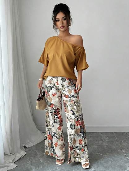 Women Summer Casual Solid Color Asymmetrical Shoulder Top And Floral Print Pants Set