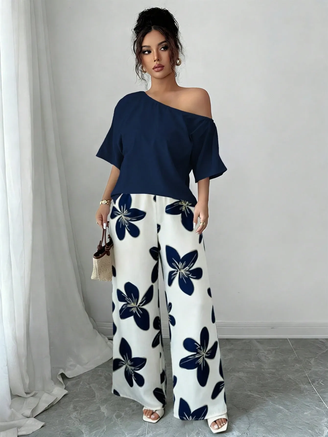 Women Summer Casual Solid Color Asymmetrical Shoulder Top And Floral Print Pants Set