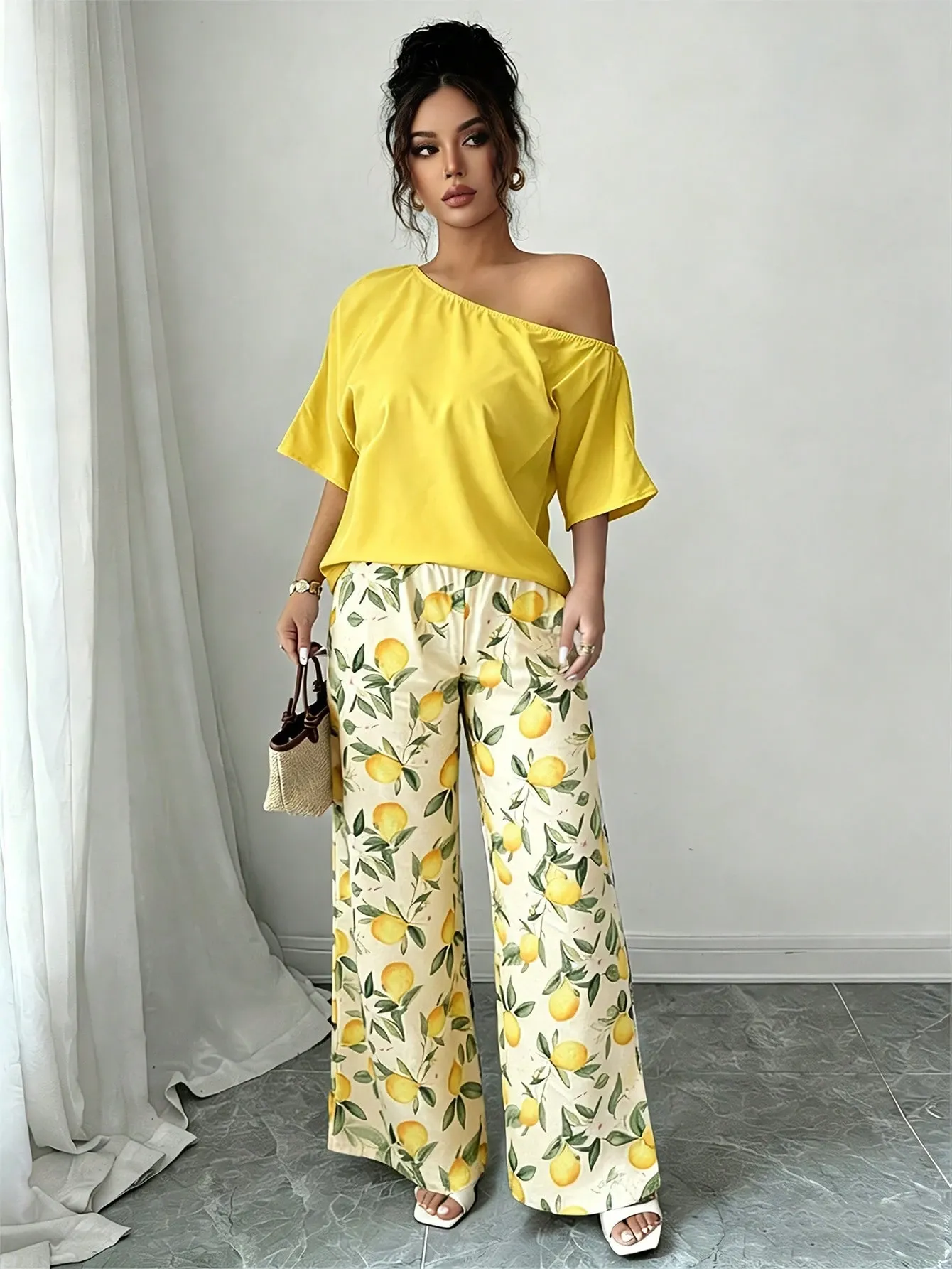 Women Summer Casual Solid Color Asymmetrical Shoulder Top And Floral Print Pants Set