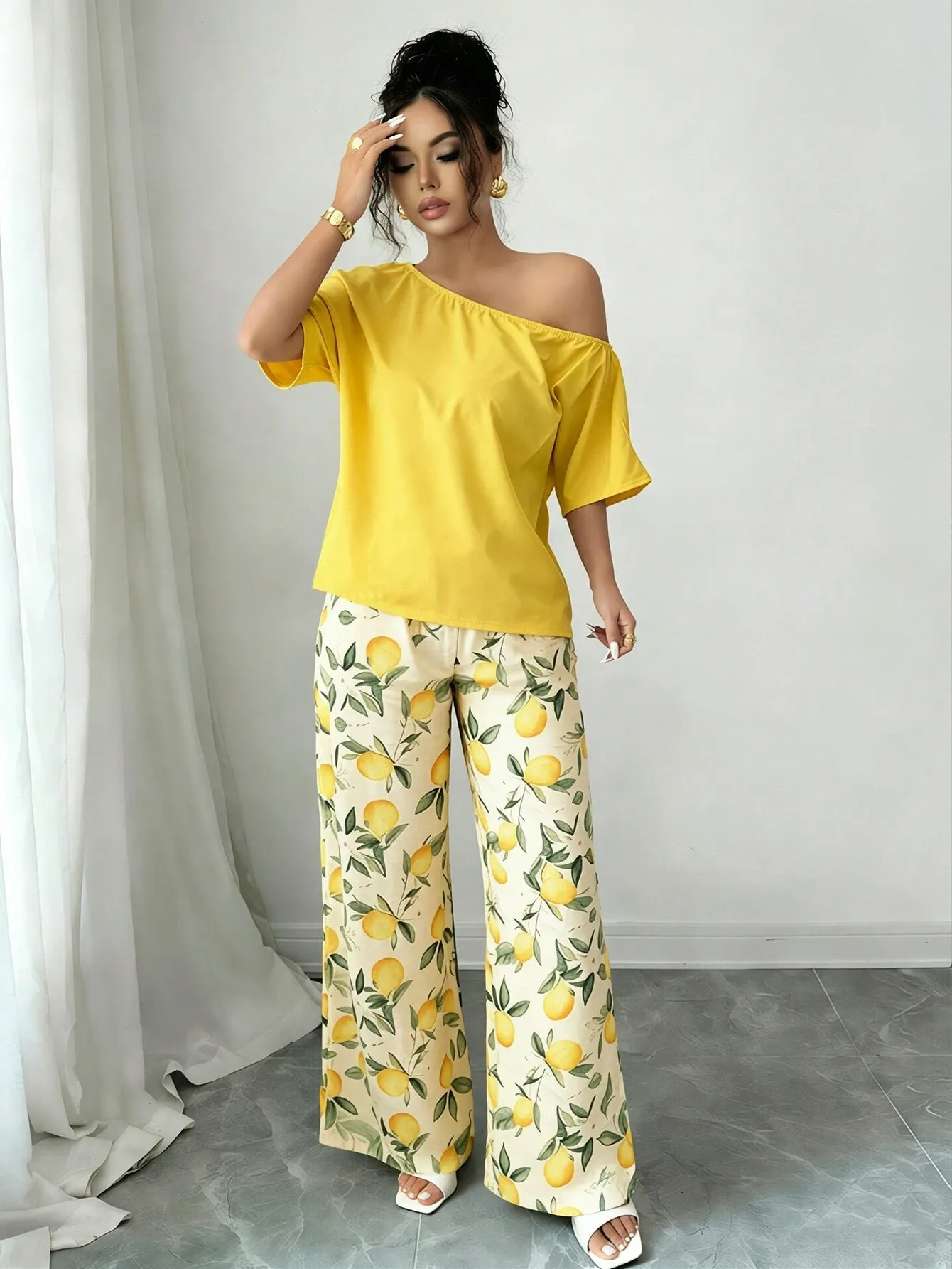 Women Summer Casual Solid Color Asymmetrical Shoulder Top And Floral Print Pants Set