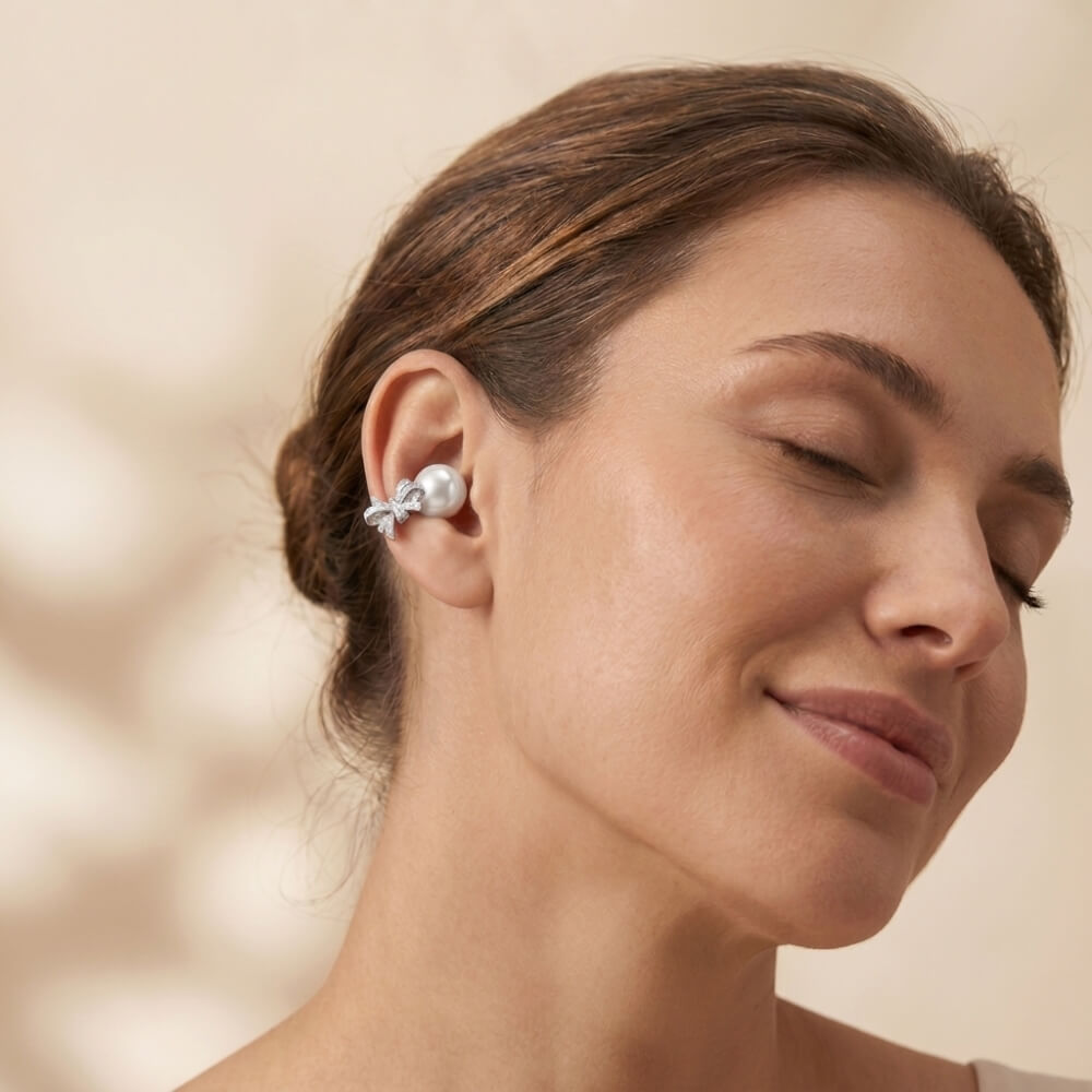 Adorn clip-on earbud on the outer edge of the ear