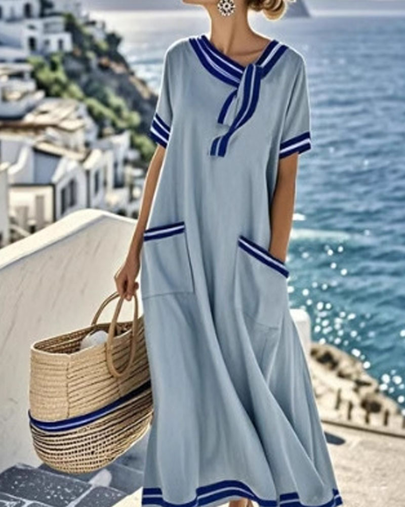 Chic Short-Sleeve Loose Maxi Dress with Bow, Pockets, and Flared Hem