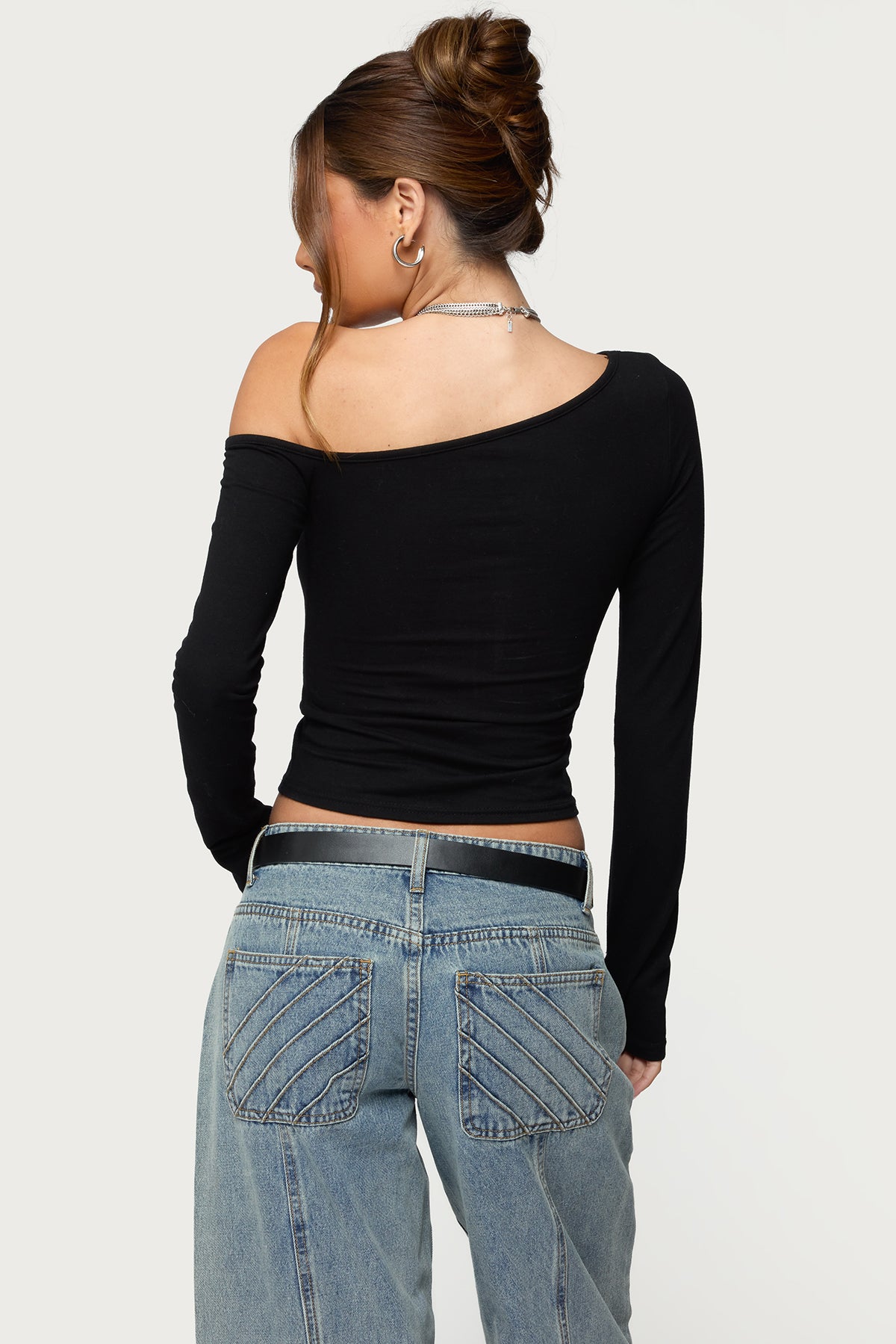 Swan Asymmetric Top-Milans Time