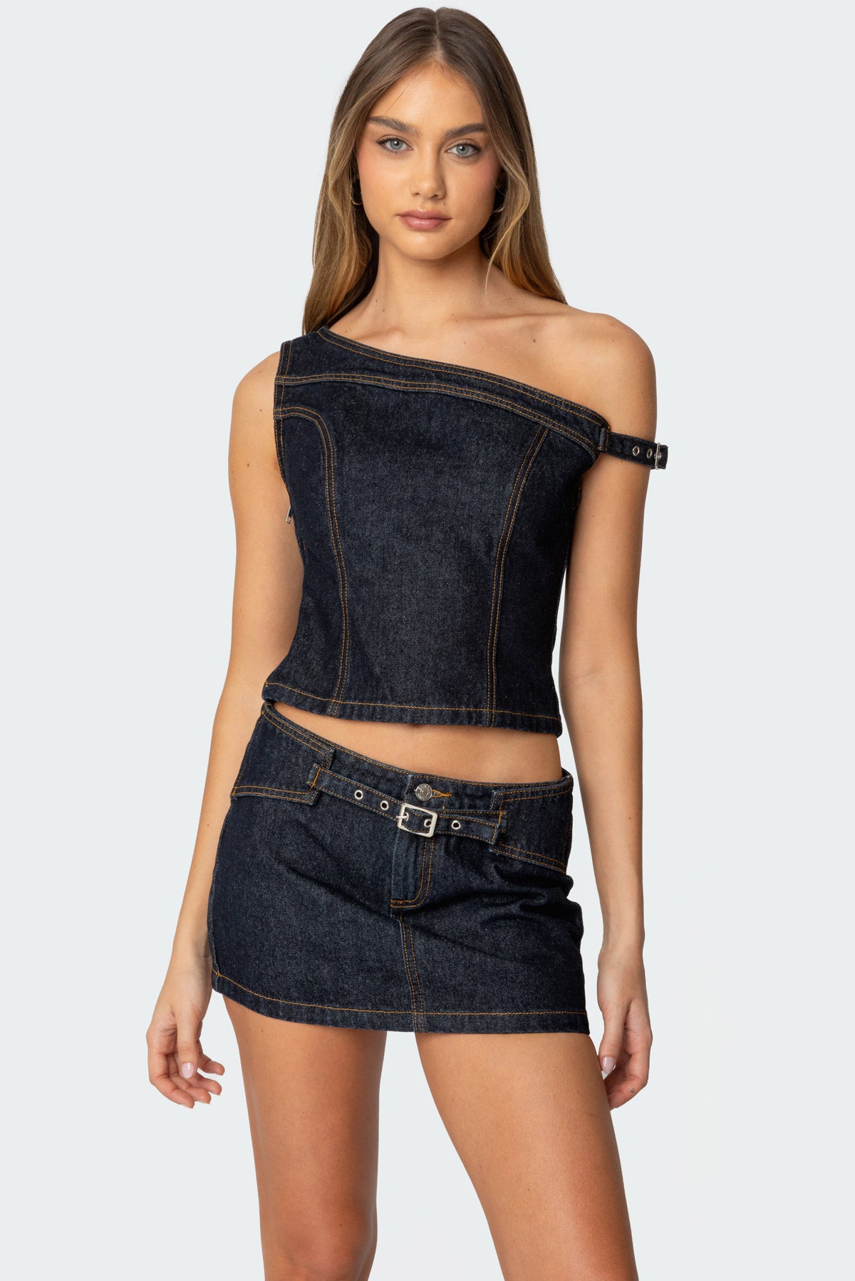 Keira Buckled Asymmetric Denim Top-Milans Time