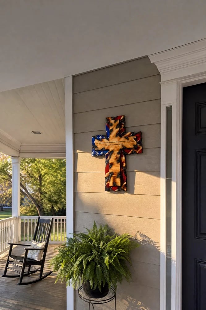Tattered Flag Cross on a covered front porch Tattered Flag Cross on a covered front porch
