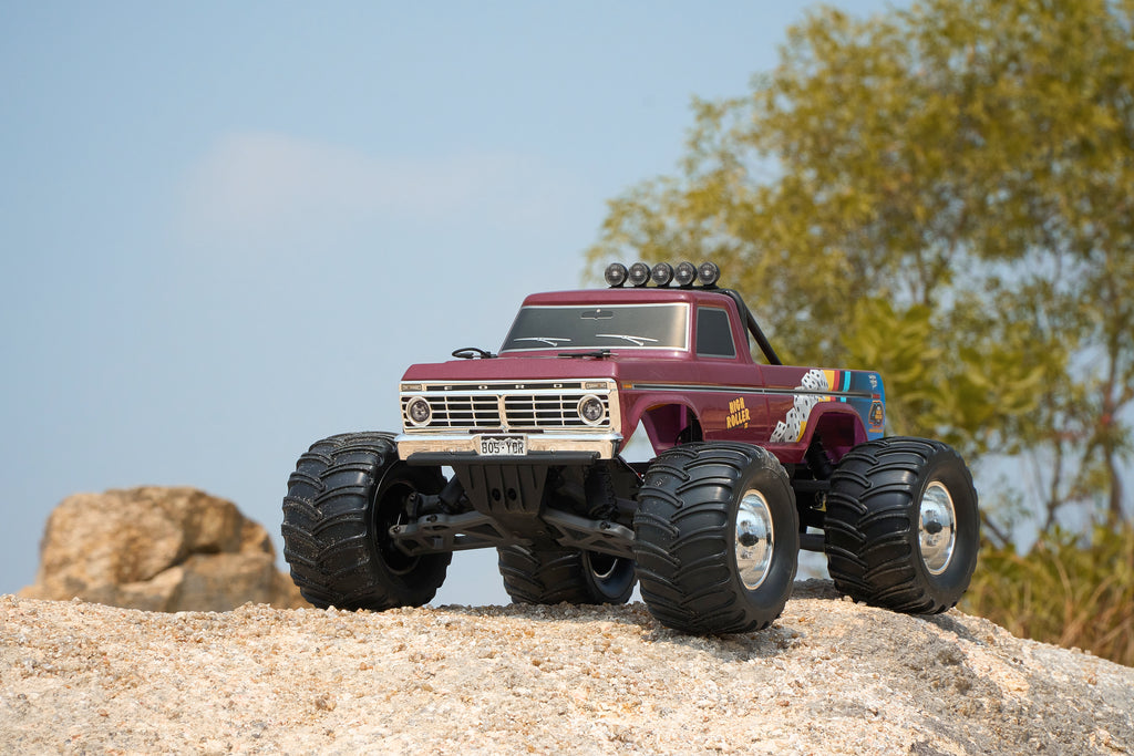 RC monster truck on rocky hillside
