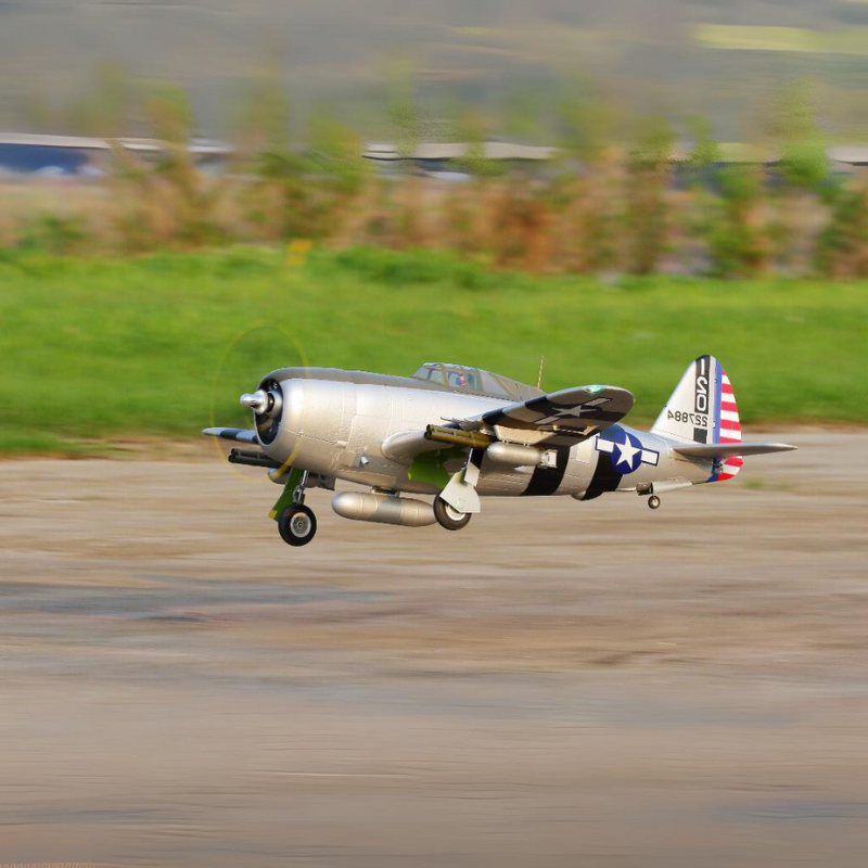 FMS P-47 Thunderbolt 'Bonnie' flying with detailed scale design in action.