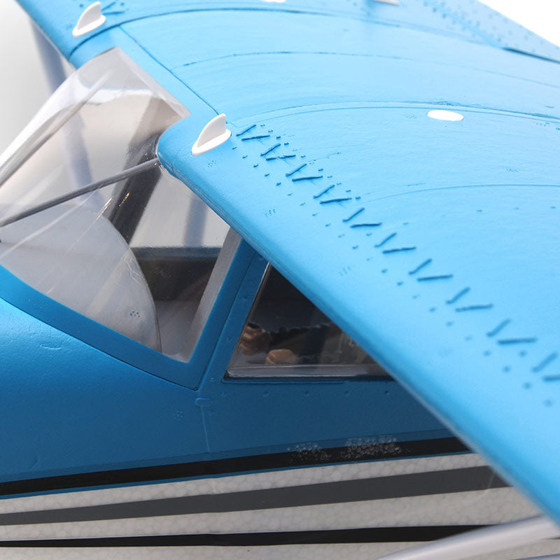 FMS 1500mm Maule RC airplane wing and cockpit detail, blue with rivets and clear windows